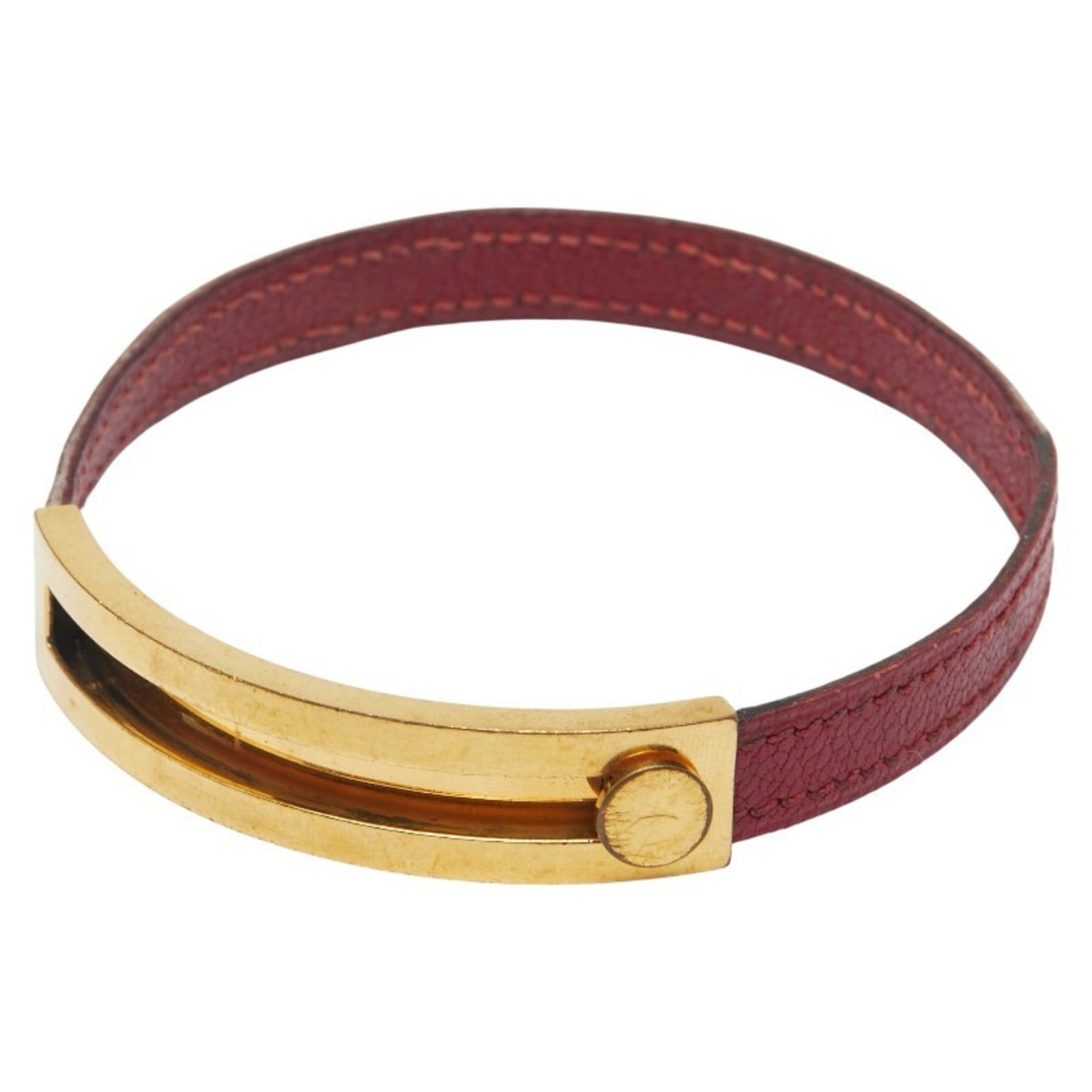 Hermes Bangle Leather: Hermes Bangle Leather Red Hermes Bangle Leather, 21.5cm in length, bears traces of usage with scratches and dirt visible, offering a worn-in look that adds character to the classic design. The leather
