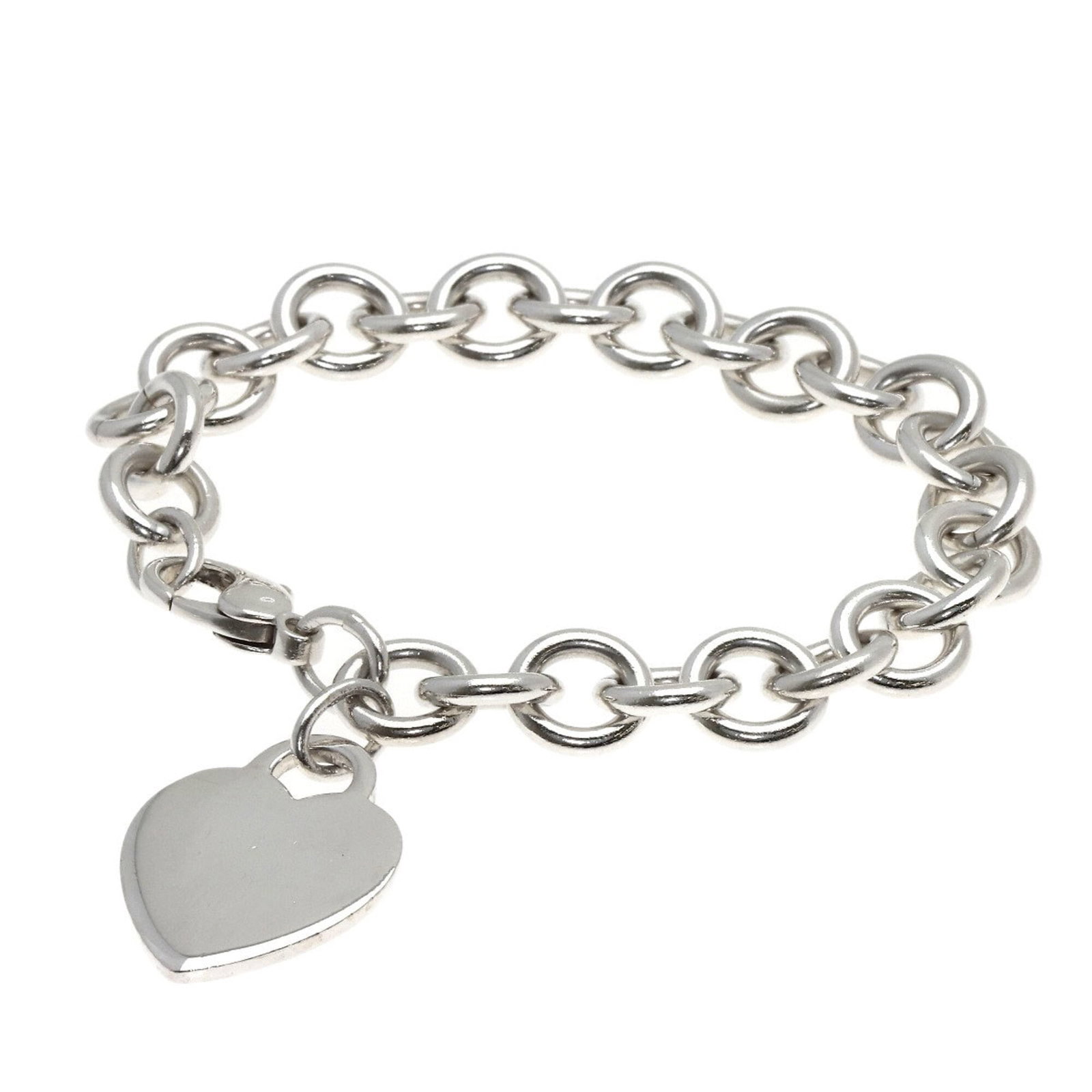 Charm bracelet silver of Tiffany: Charm bracelet silver of Tiffany Silver Tiffany charm bracelet with a length of 17cm, bearing little signs of use. This like-new condition piece showcases the brand's signature style, making it a