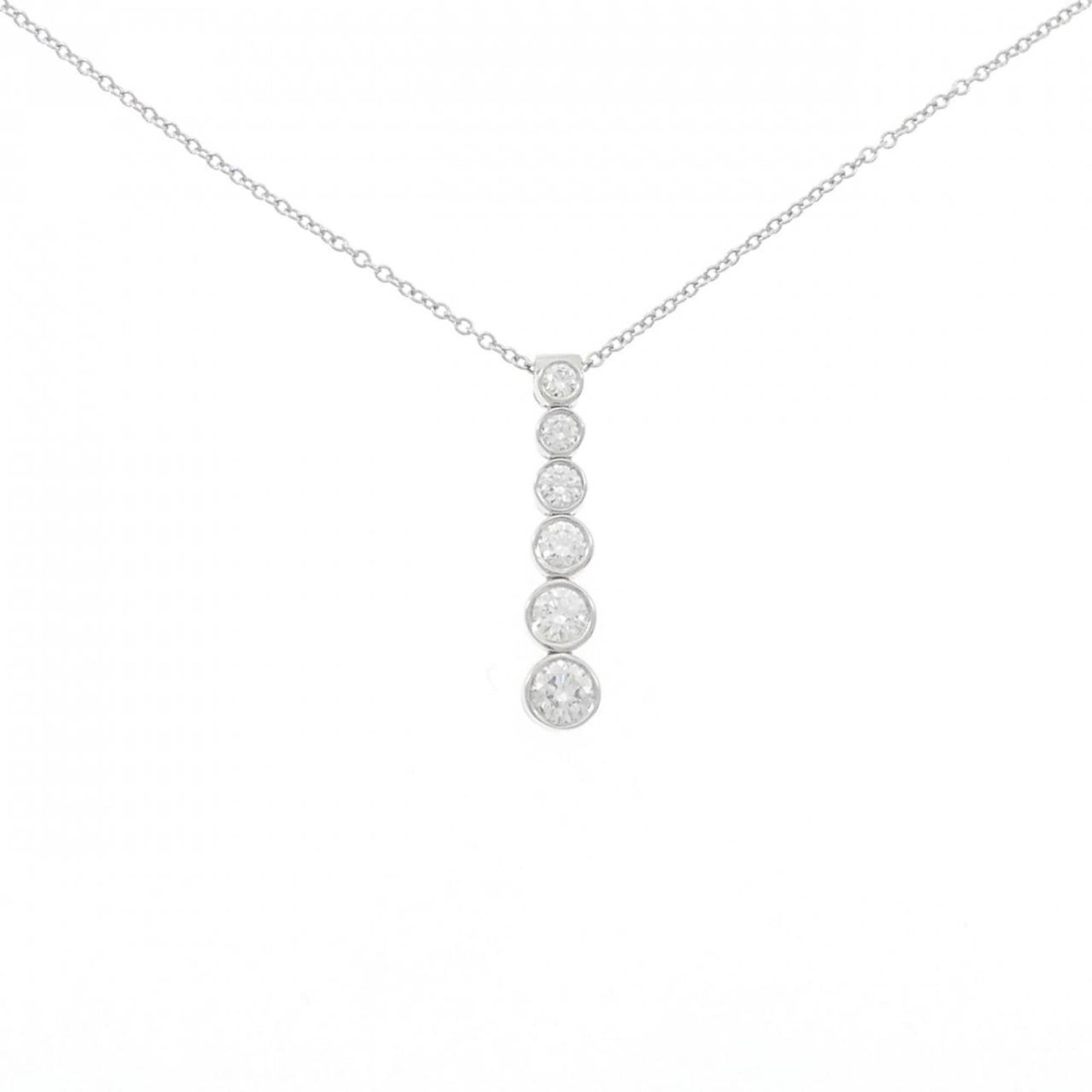 Jazz Drop Necklace by Tiffany & Co.: Jazz Drop Necklace by Tiffany & Co. Platinum pendant featuring a diamond, part of the Jazz Drop Necklace by Tiffany & Co. in excellent used condition with some minor scratches and dirt. The necklace m