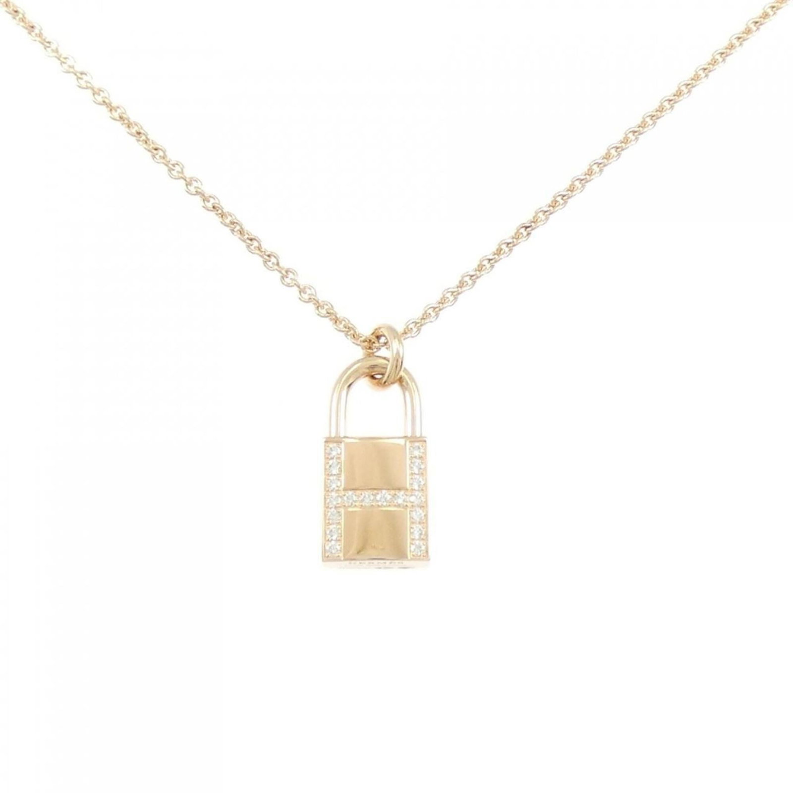 Hermes Cadena Necklace: Hermes Cadena Necklace Pink gold (18K) Cadena necklace featuring a diamond pendant, available in sizes 38-40 cm. The necklace bears some signs of usage, with minor scratches and dirt visible, but