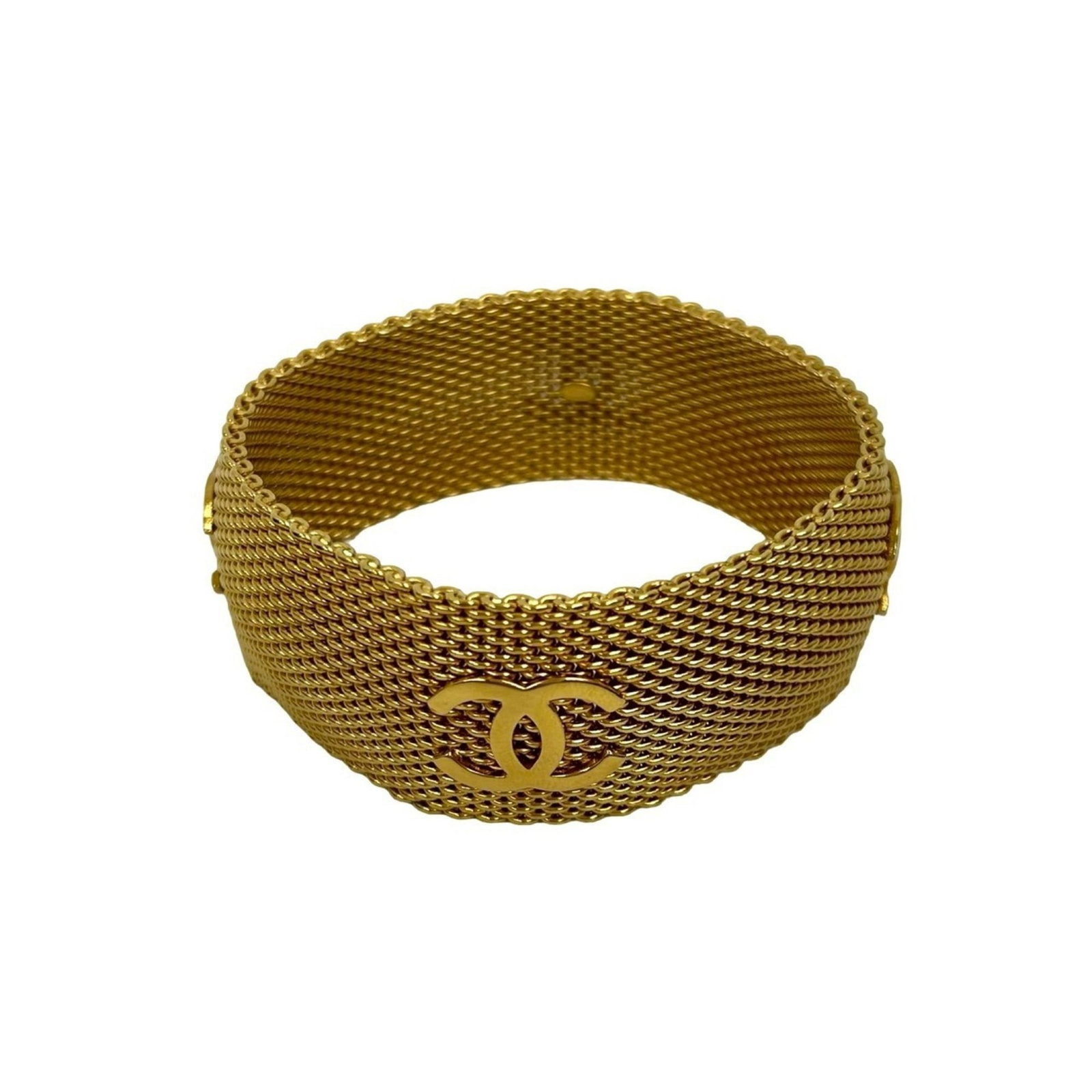 Chanel Bangle Gold Plating: Chanel Bangle Gold Plating Gold Plating Bangle from Chanel, measuring 19cm in length. This bangle features gold plating and has been used, with traces of usage visible due to scratches and dirt. The