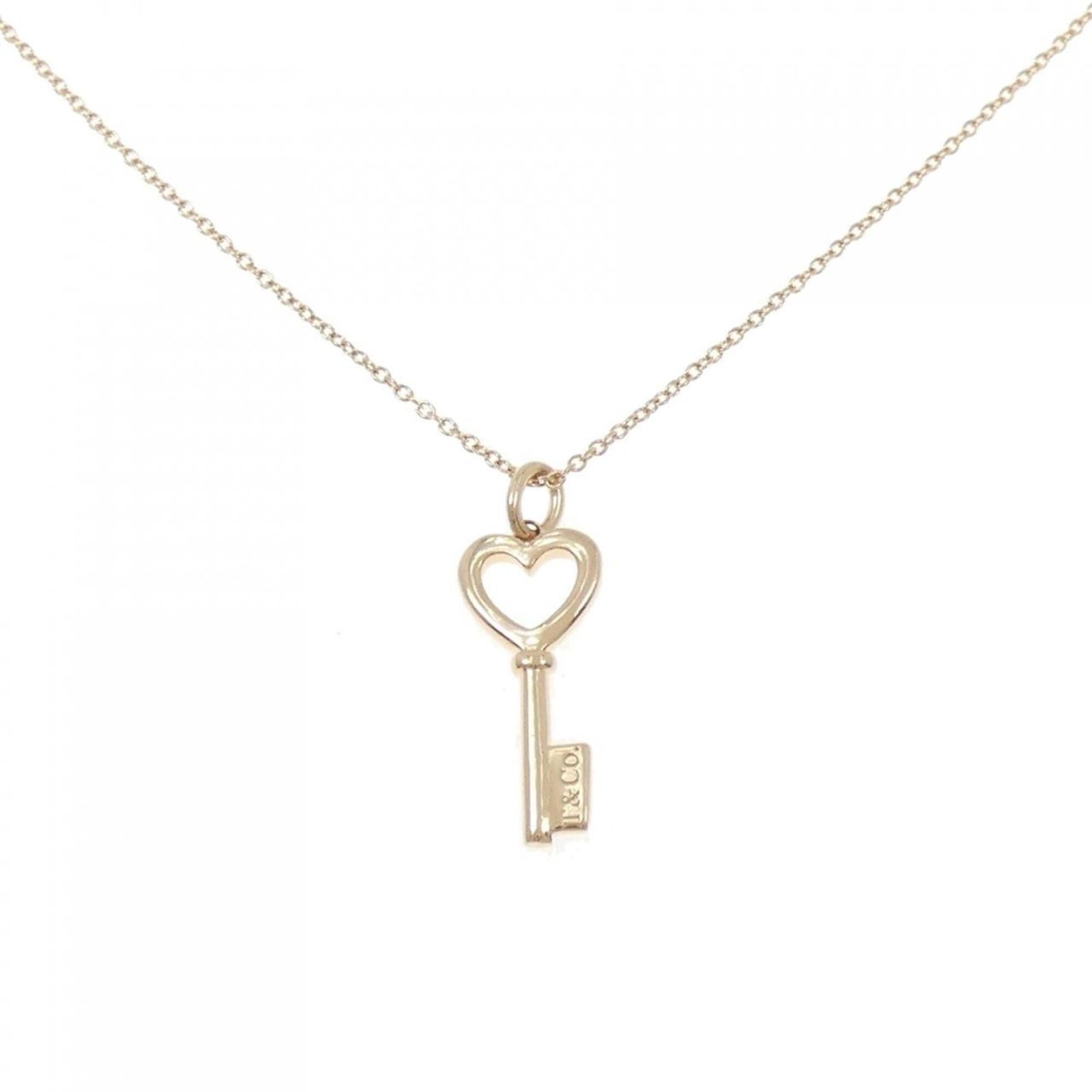 Key necklace Heart Tiffany: Key necklace Heart Tiffany Pink Gold (18K) Tiffany Necklace with Heart Pendant. This beautiful necklace features a 22.5mm x 8.2mm heart pendant set in pink gold, suspended from a chain that fits a 41