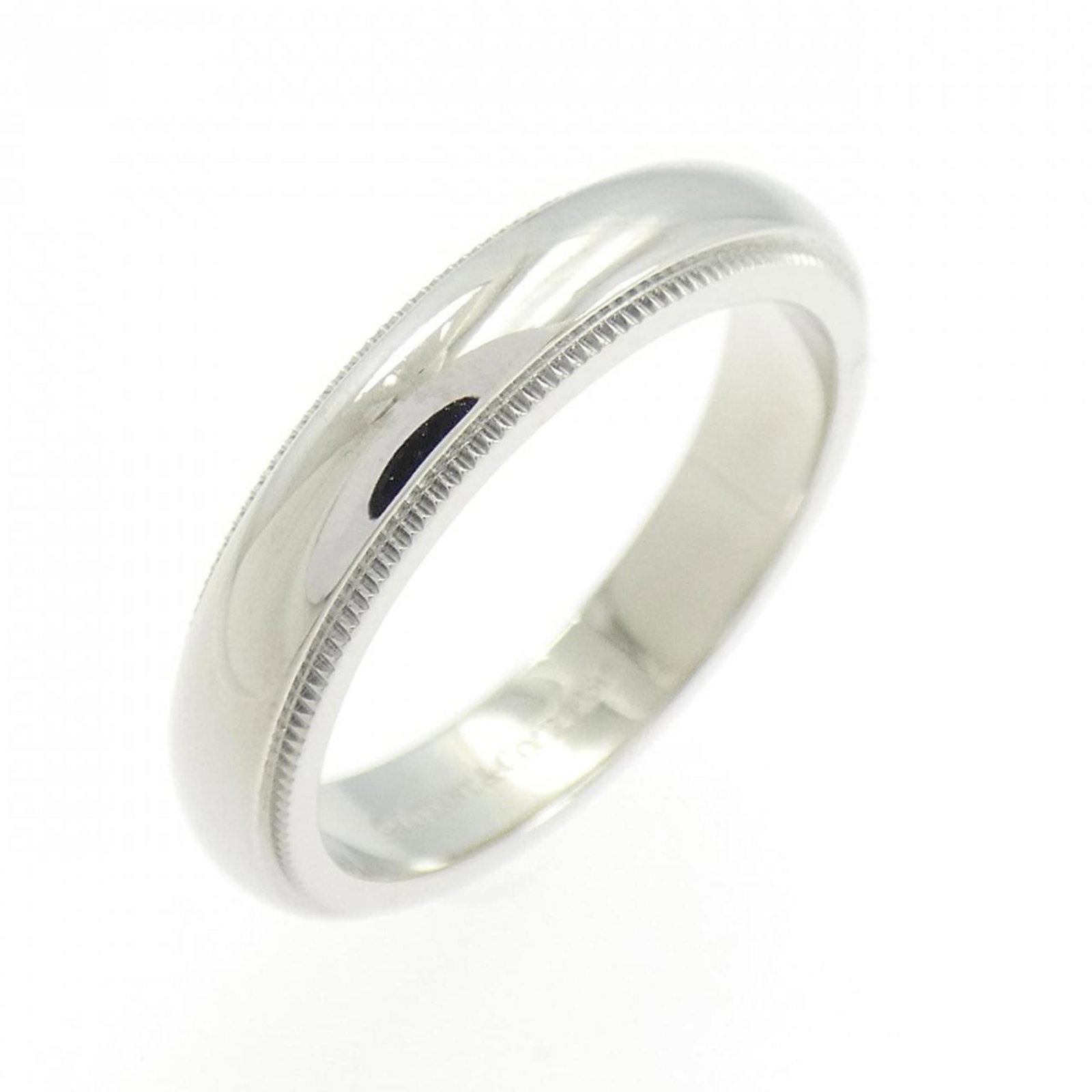 Platinum ring by Tiffany band: Platinum ring by Tiffany band Platinum ring by Tiffany features a band design made from high-quality platinum, with a US size 6.5 to fit comfortably on the finger. The ring has been used and shows