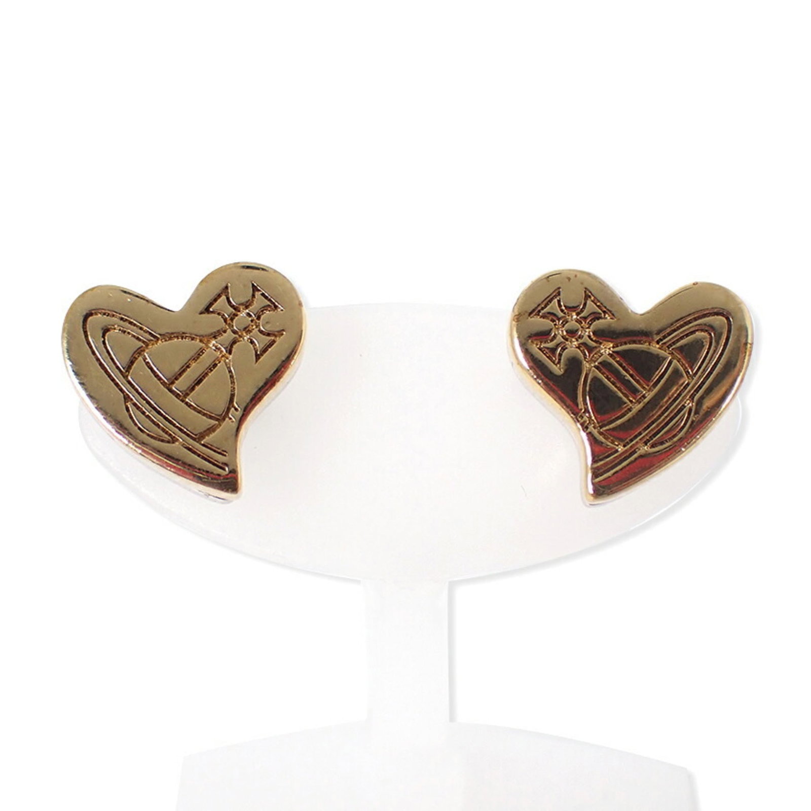 Westwood Vivienne Stud Earrings: Westwood Vivienne Stud Earrings Gold and silver stud earrings from Vivienne Westwood, bearing a signature. The earrings are in very good condition with some minor scratches and dirt, measuring