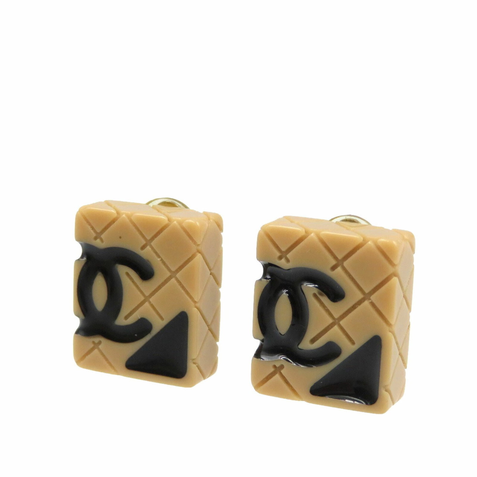 Chanel Clip Earrings Gold Plating Plastic: Chanel Clip Earrings Gold Plating Plastic Chanel Clip Earrings in Gold Plating and Plastic feature a classic design with a subtle beige and black color combination. Made from gold plating and