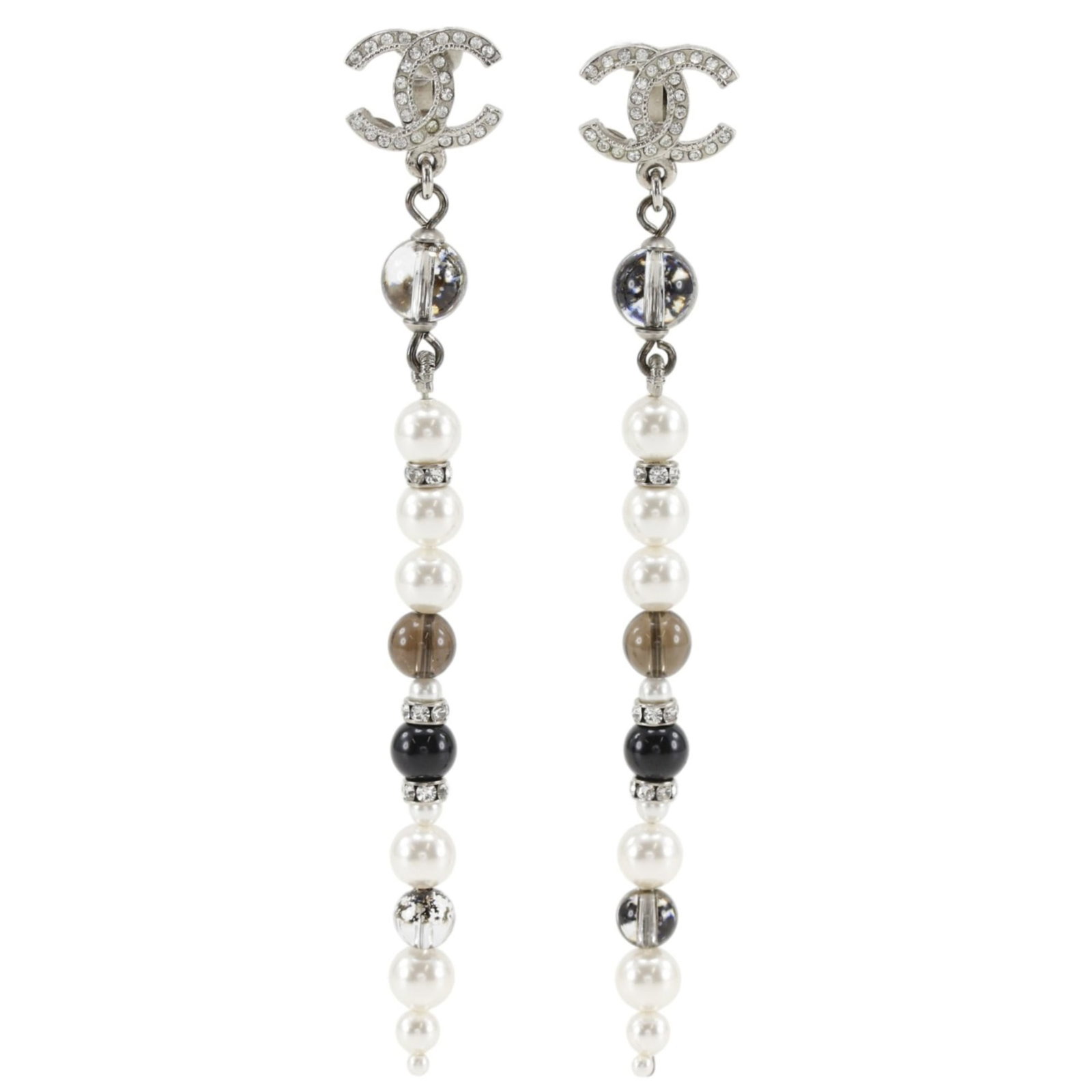 Chanel Clip Earrings: Chanel Clip Earrings Silver clip earrings from Chanel, featuring rhinestone stones and measuring 95.00mm x 9.00mm in size, weigh 11g / 0.38oz. In mint condition, like a new item with no signs of wear.