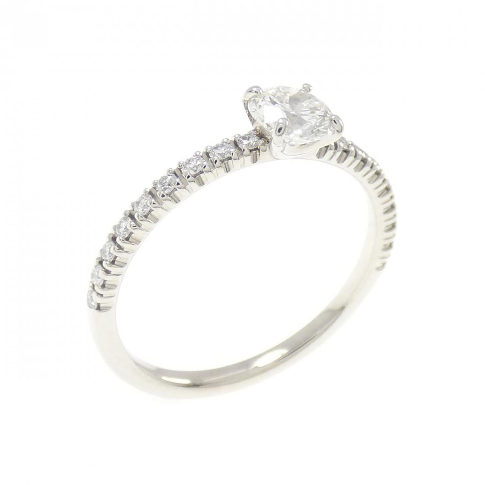 Ring Band by Platinum 950: Ring Band by Platinum 950 Made from platinum 950, this Cartier ring band features a diamond stone and boasts a classic design. The band itself has some minor scratches and dirt, but remains in very