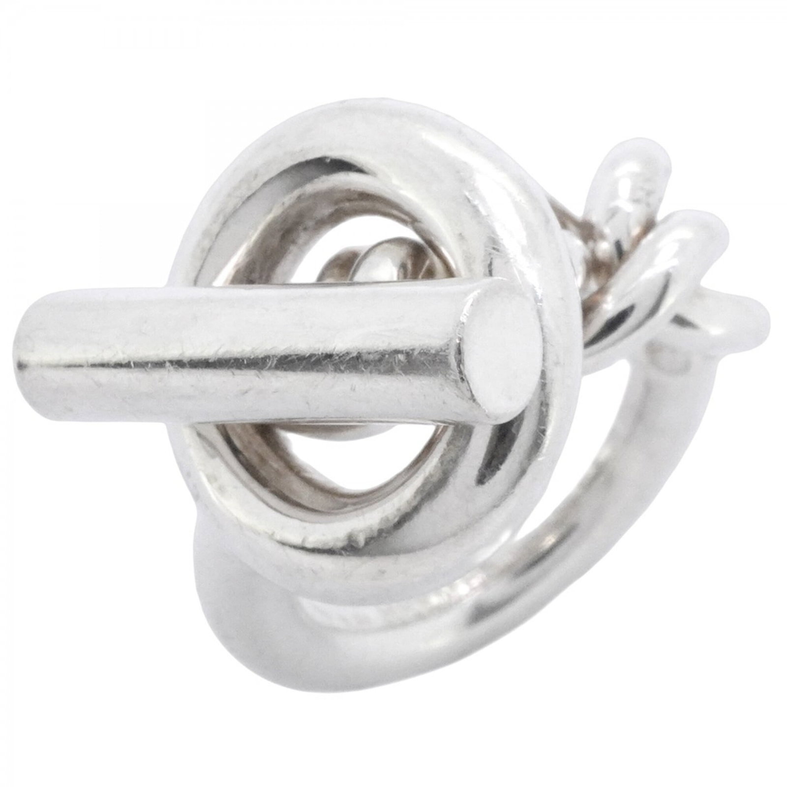 Ring Hermes Silver Band 925: Ring Hermes Silver Band 925 Silver band ring from Hermes, made from 925 sterling silver. The ring bears traces of usage and minor damages, but remains in acceptable condition for continued wear. This