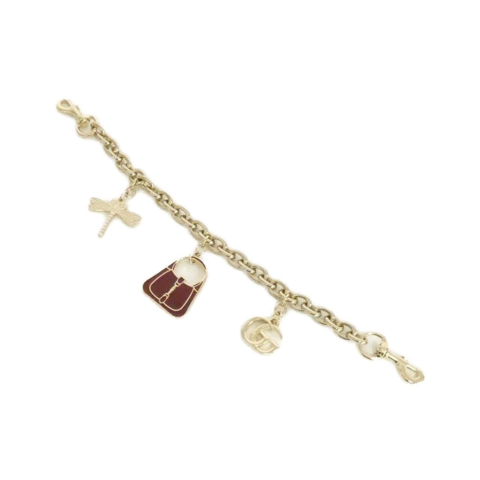 Handbag Charm of Gucci: Handbag Charm of Gucci Gold Gucci handbag charm in very good condition, with a few traces of usage and minor scratches/dirt. The charm bears a signature but details on its origin are unknown. A used