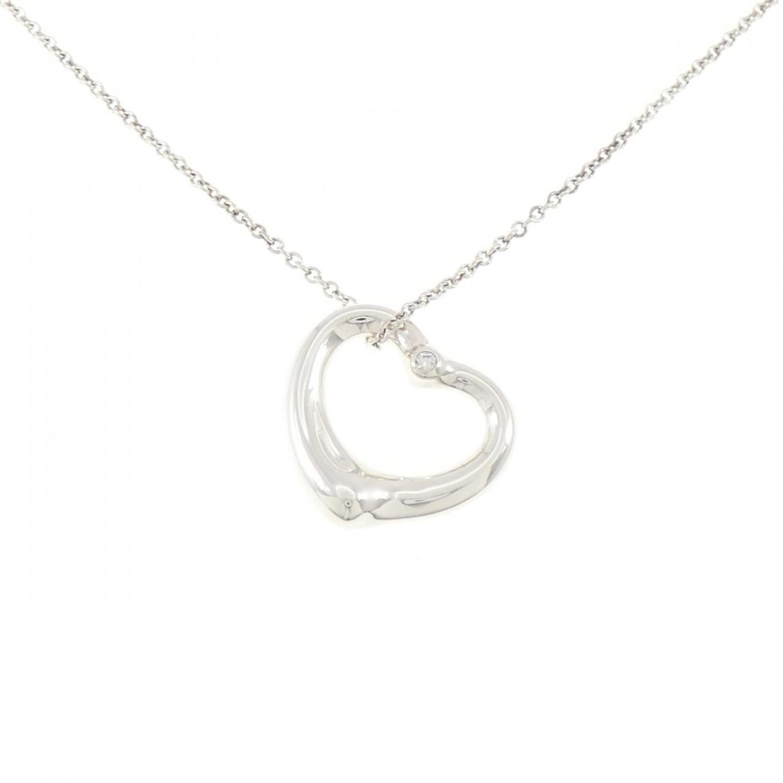 Heart Open Tiffany Necklace: Heart Open Tiffany Necklace The Heart Open Tiffany Necklace boasts a sleek silver design, featuring a pendant with a diameter of 21.9mm x 22.2mm. Made from high-quality 925 silver, this necklace