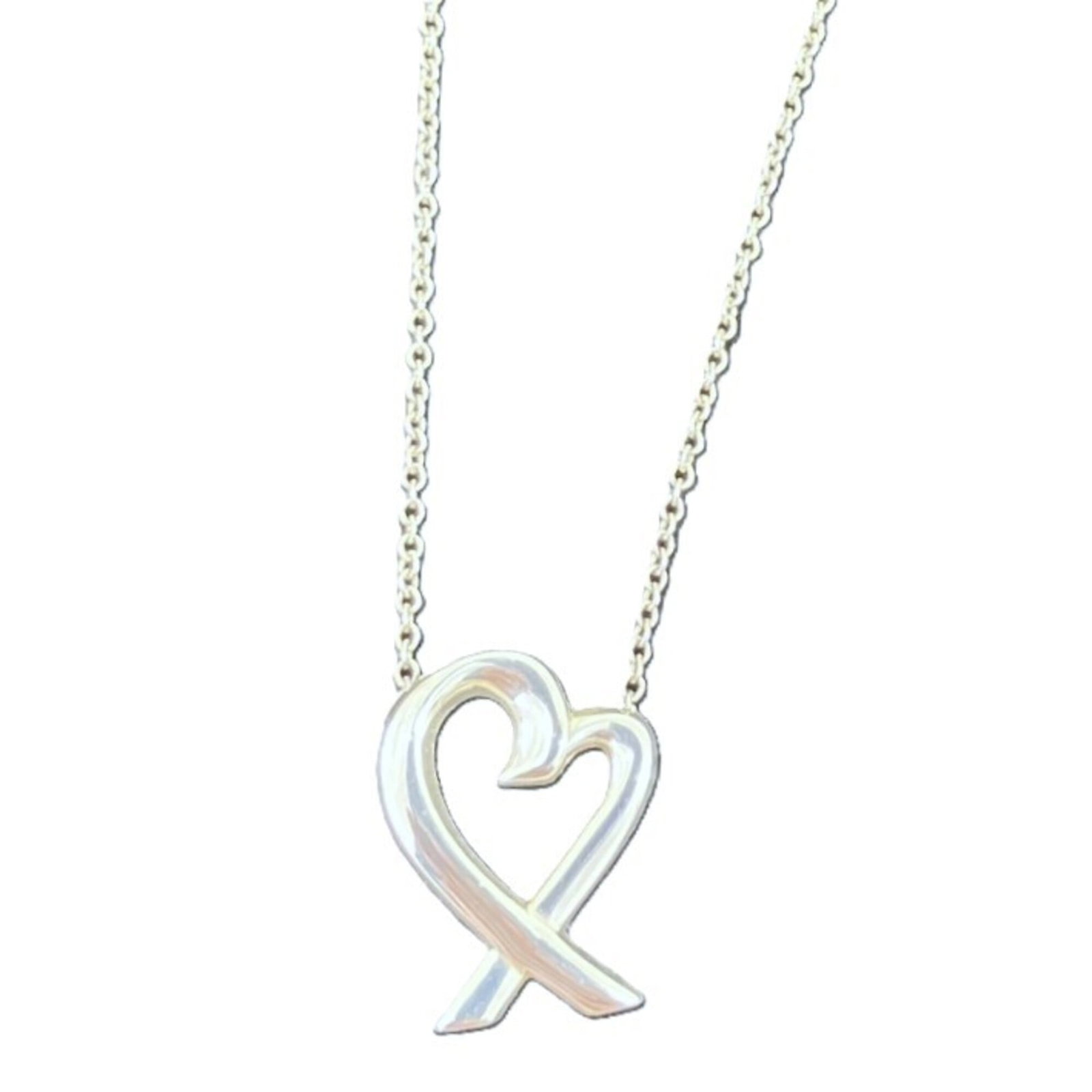 Tiffany & Co. Loving Heart Necklace 2.5G Sterling Silver 925: Tiffany & Co. Loving Heart Necklace 2.5G Sterling Silver 925 Tiffany & Co. Loving Heart Necklace in sterling silver, featuring a 15mm x 10mm pendant with a subtle design. The necklace boasts a
