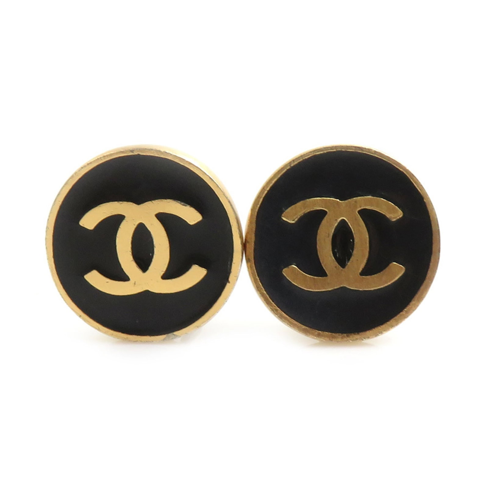 Enamel Metal Clip Chanel Earrings: Enamel Metal Clip Chanel Earrings Item Specifics: Brand: Chanel Type: Clip Earrings Gender: Women Material: Enamel, Metal Color: Black, Gold Condition: Used (good), Traces of usage, scratches / dirt