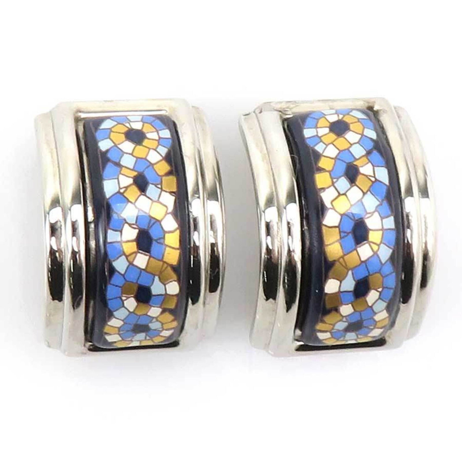 Enamel metal Hermes earrings clip: Enamel metal Hermes earrings clip Enamel metal Hermes earrings clip in blue, gold, navy, and silver. The item features a distinctive clip design with traces of usage, scratches, and dirt visible but g