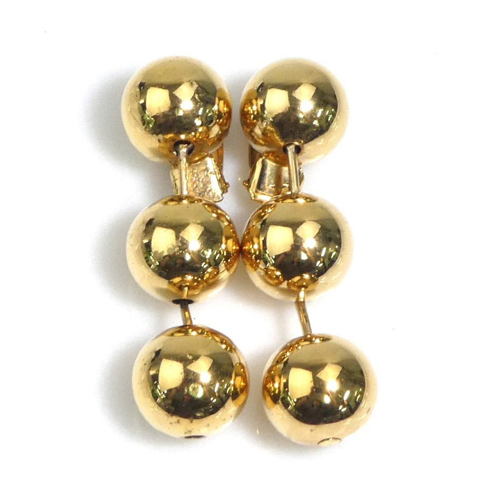 Metal clip earrings by Balenciaga: Metal clip earrings by Balenciaga Metal clip earrings by Balenciaga, bearing the signature of the renowned fashion house. Made from metal and available in gold, these clip earrings showcase a classic 