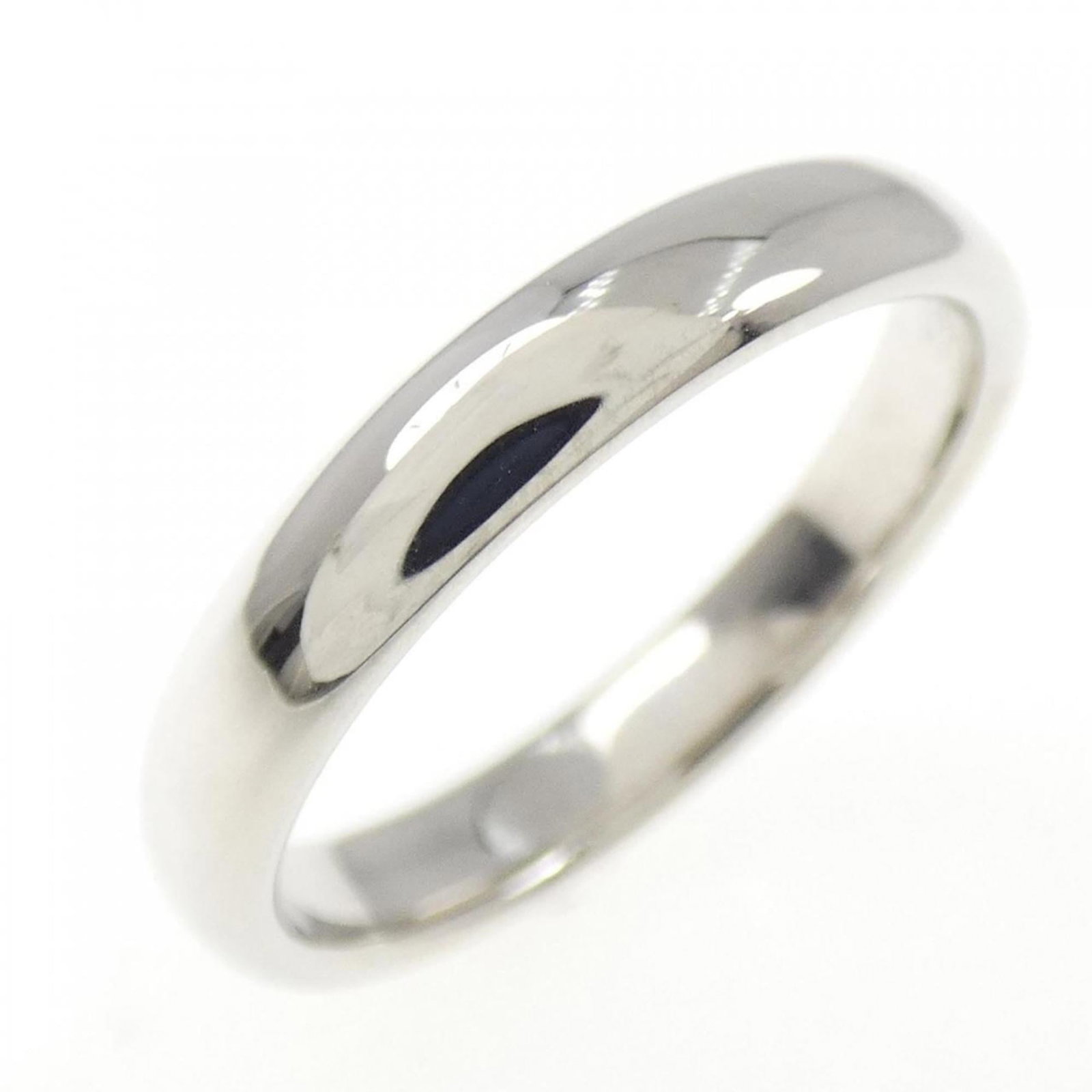 Tiffany Band Ring: Tiffany Band Ring Platinum band ring from Tiffany, featuring 950 platinum metal and a sleek 2.9mm width. The ring bears some minor scratches and dirt, but remains in very good condition overall. This