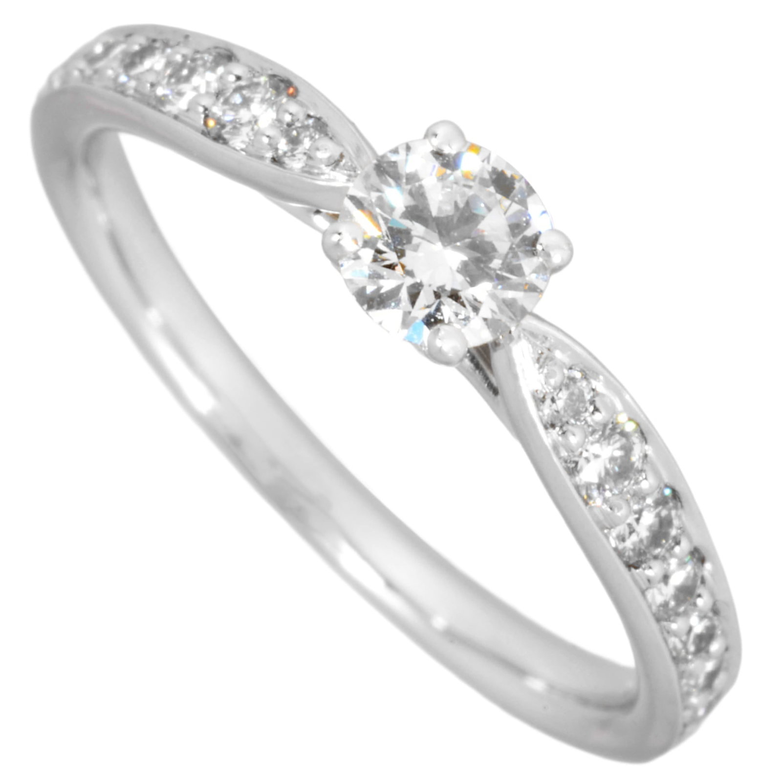 Tiffany Band Ring: Tiffany Band Ring Platinum band ring from Tiffany featuring a 0.21ct diamond in an F color and Vs1 clarity, set in a high-quality platinum setting. The ring bears a signature but details on the signer
