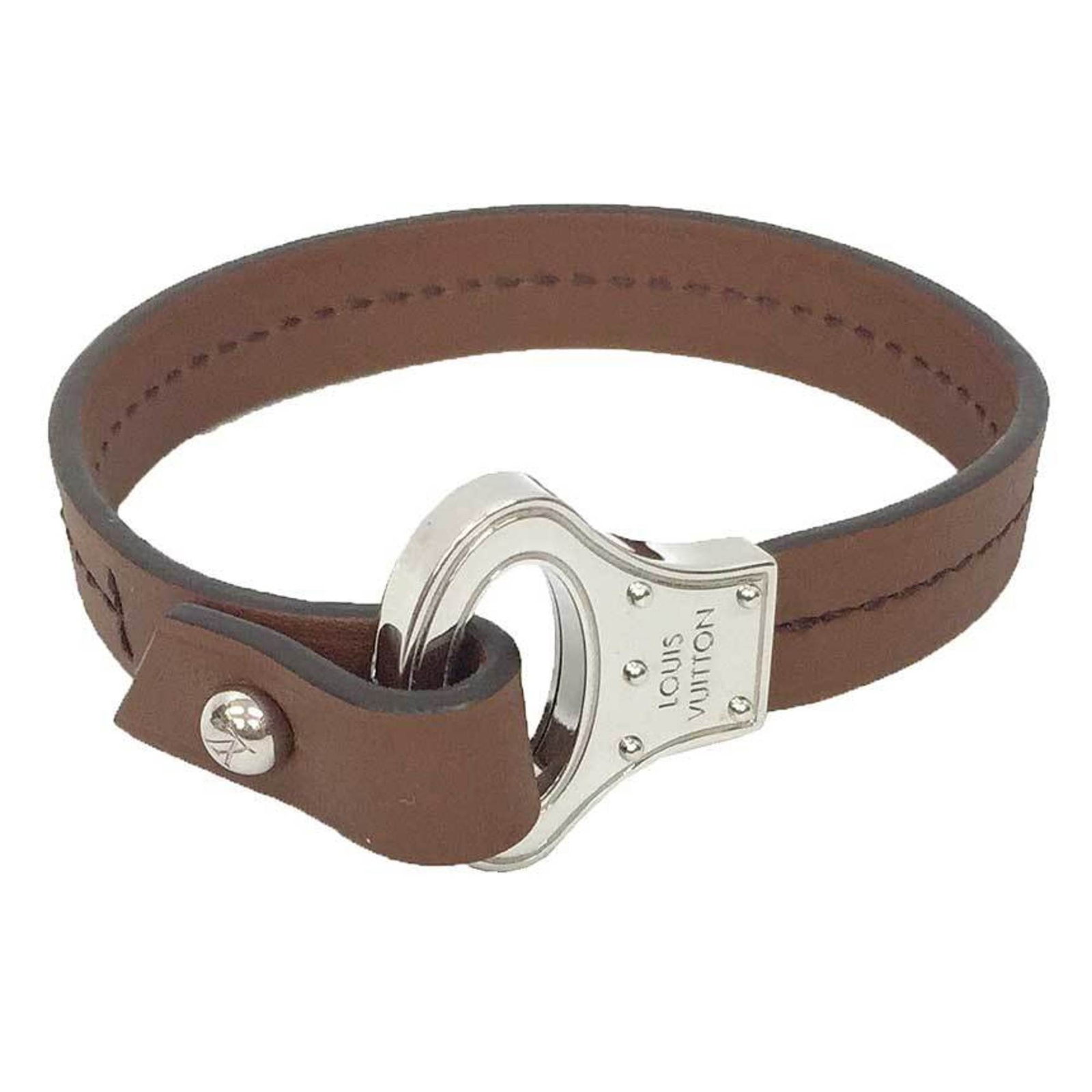 Charm Vuitton Leather Bracelet: Charm Vuitton Leather Bracelet Charm Vuitton Leather Bracelet in Brown. This used, very good condition leather bracelet features brown leather and has a width of 1.1cm / 0.43''. It bears a signature