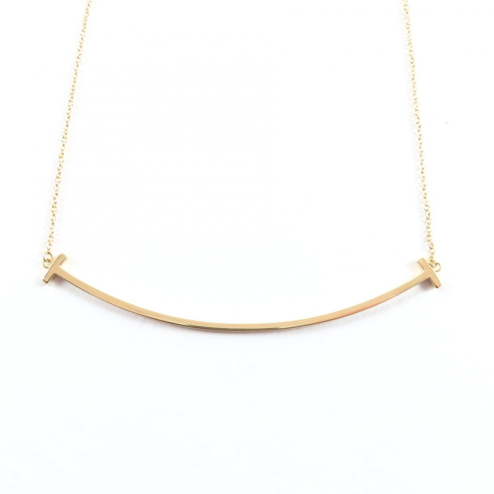 Tiffany&Co. Tiffany T Smile Pendant Large 750 (Yg) Current Model Necklace Yellow Gold Comes With: Tiffany&Co. Tiffany T Smile Pendant Large 750 (Yg) Current Model Necklace Yellow Gold Comes With Yellow Gold Tiffany&Co. Necklace with Large Pendant and Adjustable Chain, Ideal for Everyday Wear.
