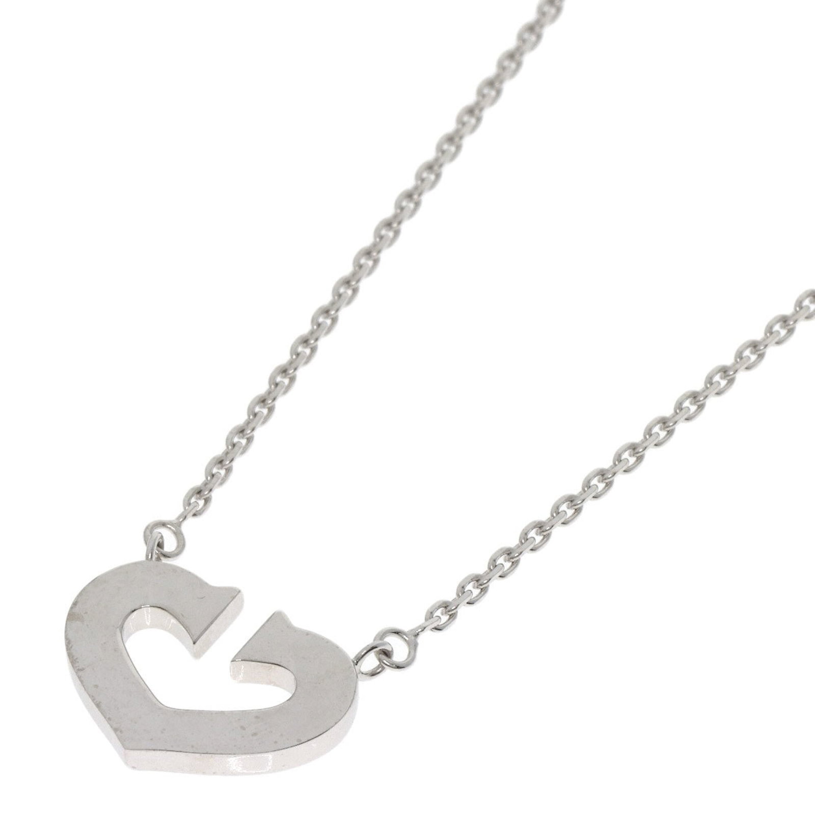 Cartier for Women's White Gold 18K C Heart Necklace: Cartier for Women's White Gold 18K C Heart Necklace Cartier for Women's White Gold 18K C Heart Necklace features a classic design with a 16.8mm x 12.4mm pendant set in white gold (18K). The necklace
