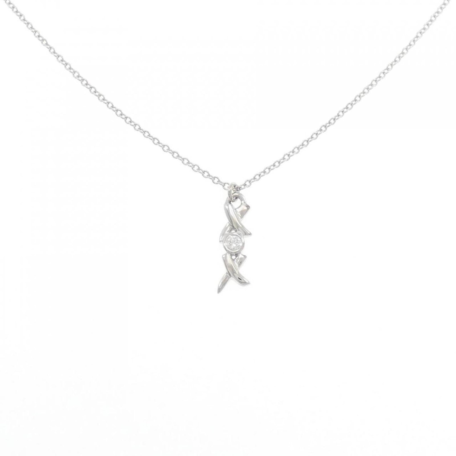 X Necklace by Tiffany: X Necklace by Tiffany White gold pendant adorned with a 1.9g diamond, set in a classic Tiffany necklace design. The 41 cm chain provides a versatile length for everyday wear. A few minor signs of use 