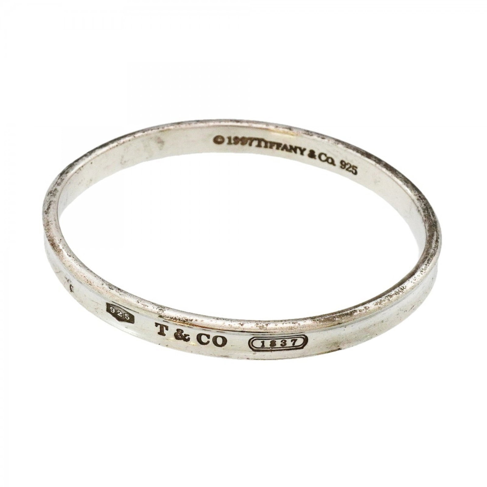Silver Bangle Tiffany: Silver Bangle Tiffany Silver Bangle Tiffany - A Timeless Accessory. This silver bangle, made from high-quality 925 material, boasts a classic design that adds a touch of sophistication to any outfit.
