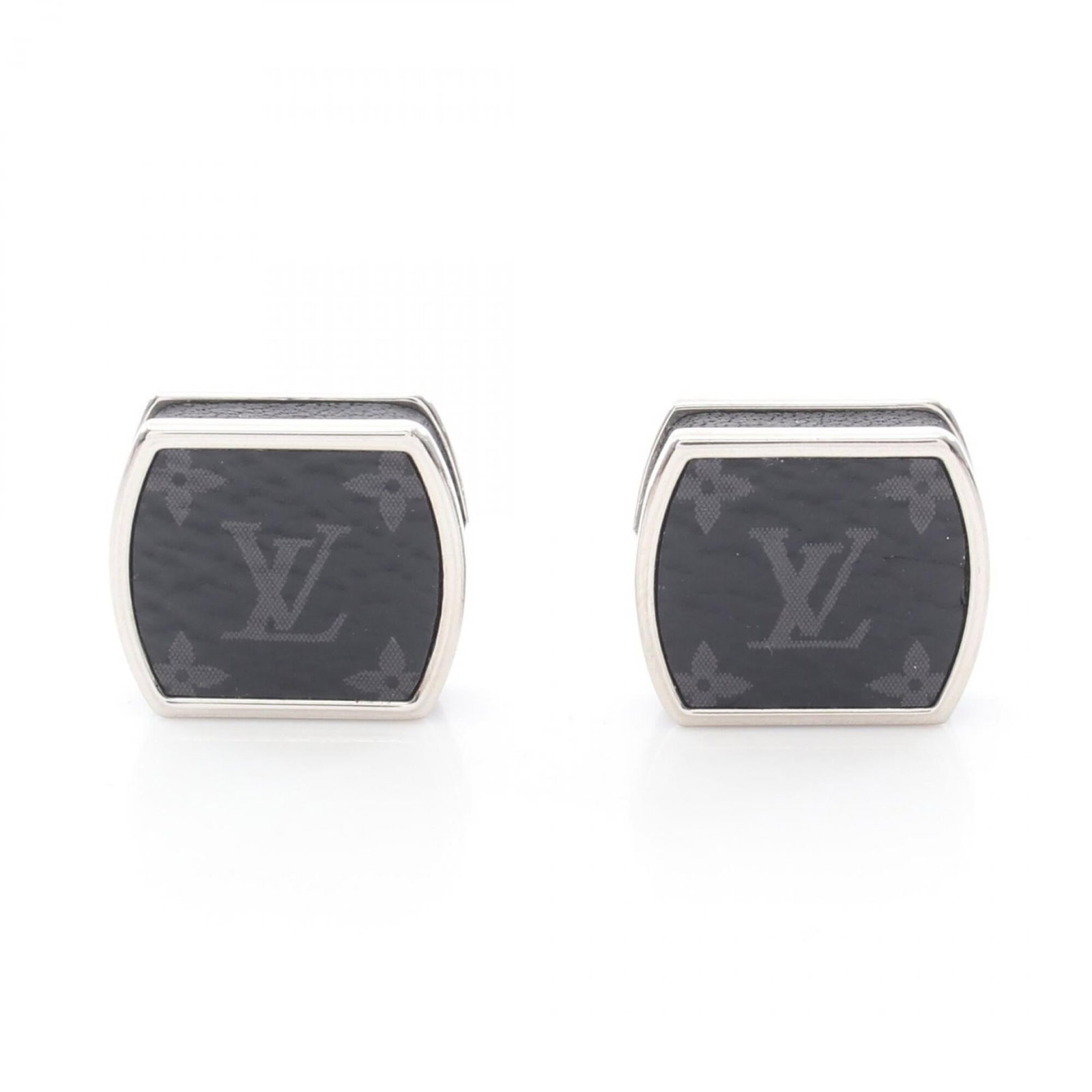 Louis Vuitton metal monogram cufflinks: Louis Vuitton metal monogram cufflinks Louis Vuitton metal monogram cufflinks are crafted from high-quality metal, featuring the iconic Monogram Eclipse design. With a subtle black and silver finish, 