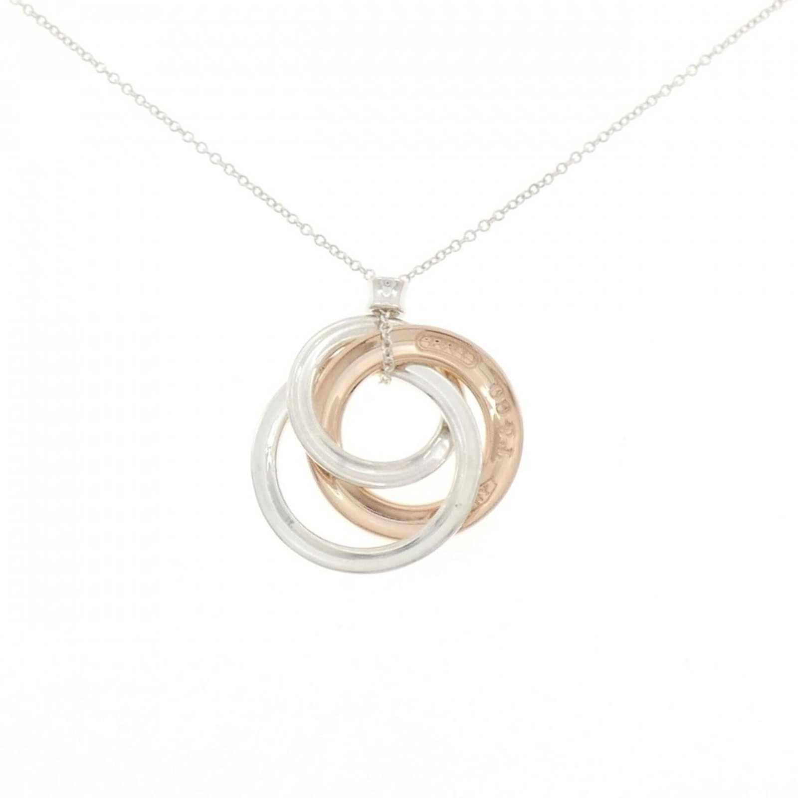 Interlocking Circle Tiffany Co Necklace: Interlocking Circle Tiffany Co Necklace Silver 925 Interlocking Circle Pendant Necklace from Tiffany & Co. Features a unique interlocking circle design in sterling silver, measuring 25mm x 20.6mm. Thi