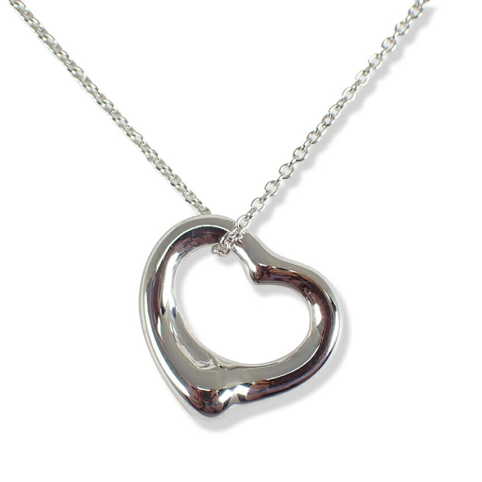 Tiffany 925 Heart Pendant Necklace: Tiffany 925 Heart Pendant Necklace Sterling silver 925 heart pendant necklace, featuring a 18.8mm x 22mm pendant with a 41 cm / 16.14'' adjustable neck circumference, bears a signature. The necklace