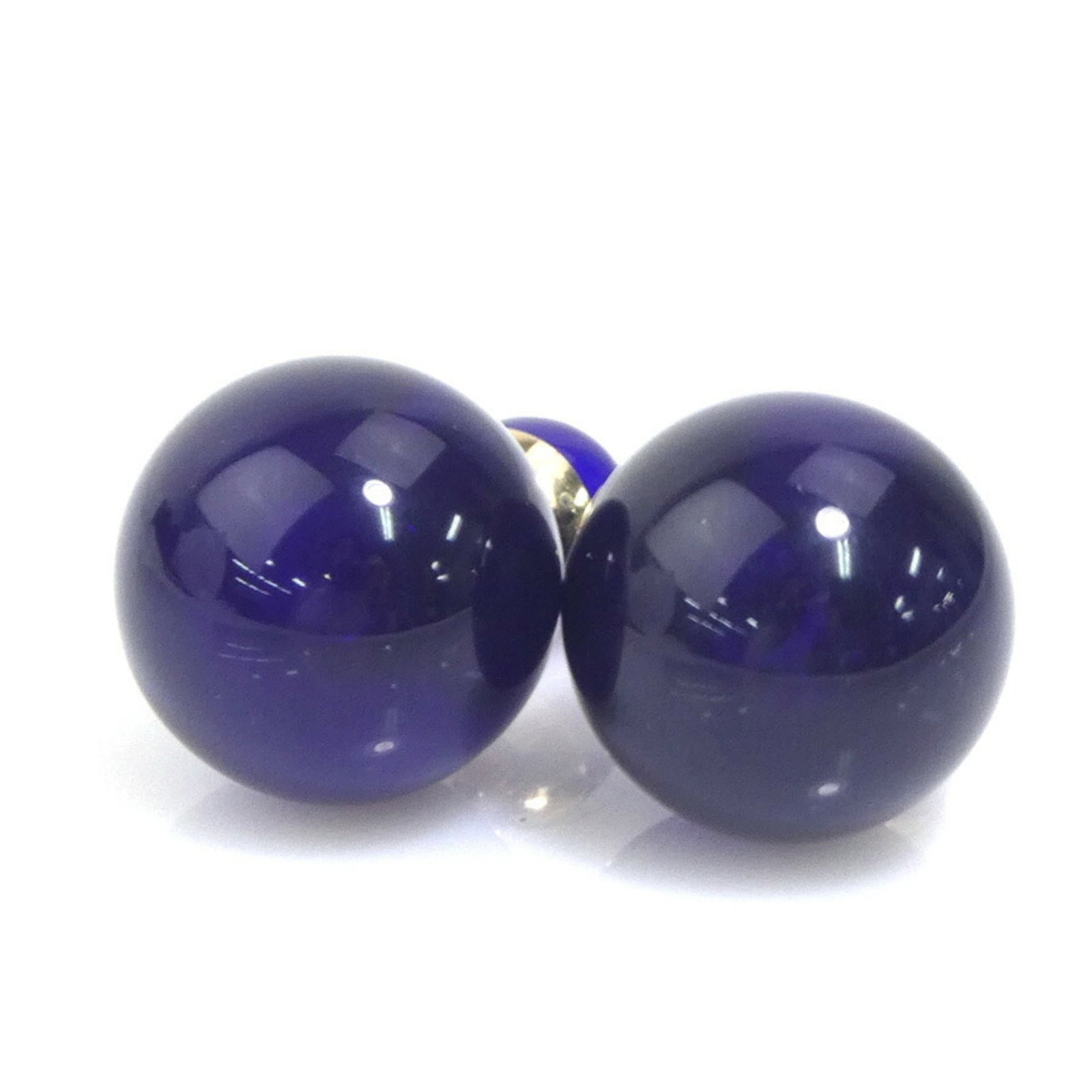 Metal Stud Earrings by Christian Dior: Metal Stud Earrings by Christian Dior Metal Stud Earrings by Christian Dior bear the signature of the renowned fashion brand, featuring a striking blue hue and sleek metal design. Made from metal and