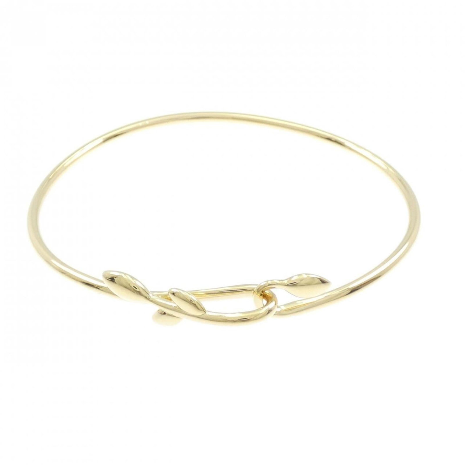 Tiffany Bangle Yellow Gold: Tiffany Bangle Yellow Gold Tiffany Bangle Yellow Gold features a classic design crafted from high-quality yellow gold, measuring 16.5cm in length. This bangle bears the signature of its creator, addin