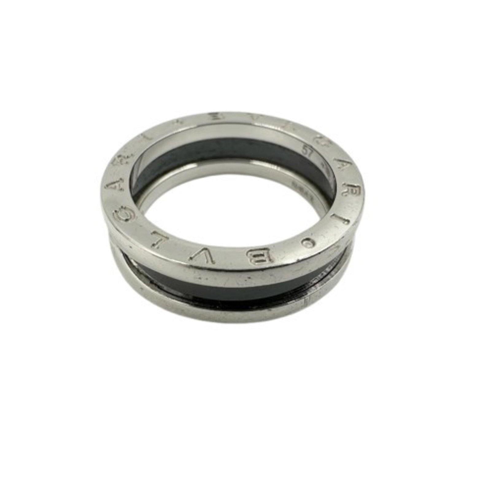 Bvlgari Band Ring Ceramic Silver 925: Bvlgari Band Ring Ceramic Silver 925 Ceramic and silver 925 details make this Bvlgari Band Ring stand out, with its unique blend of materials. The black and silver color combination adds a touch of