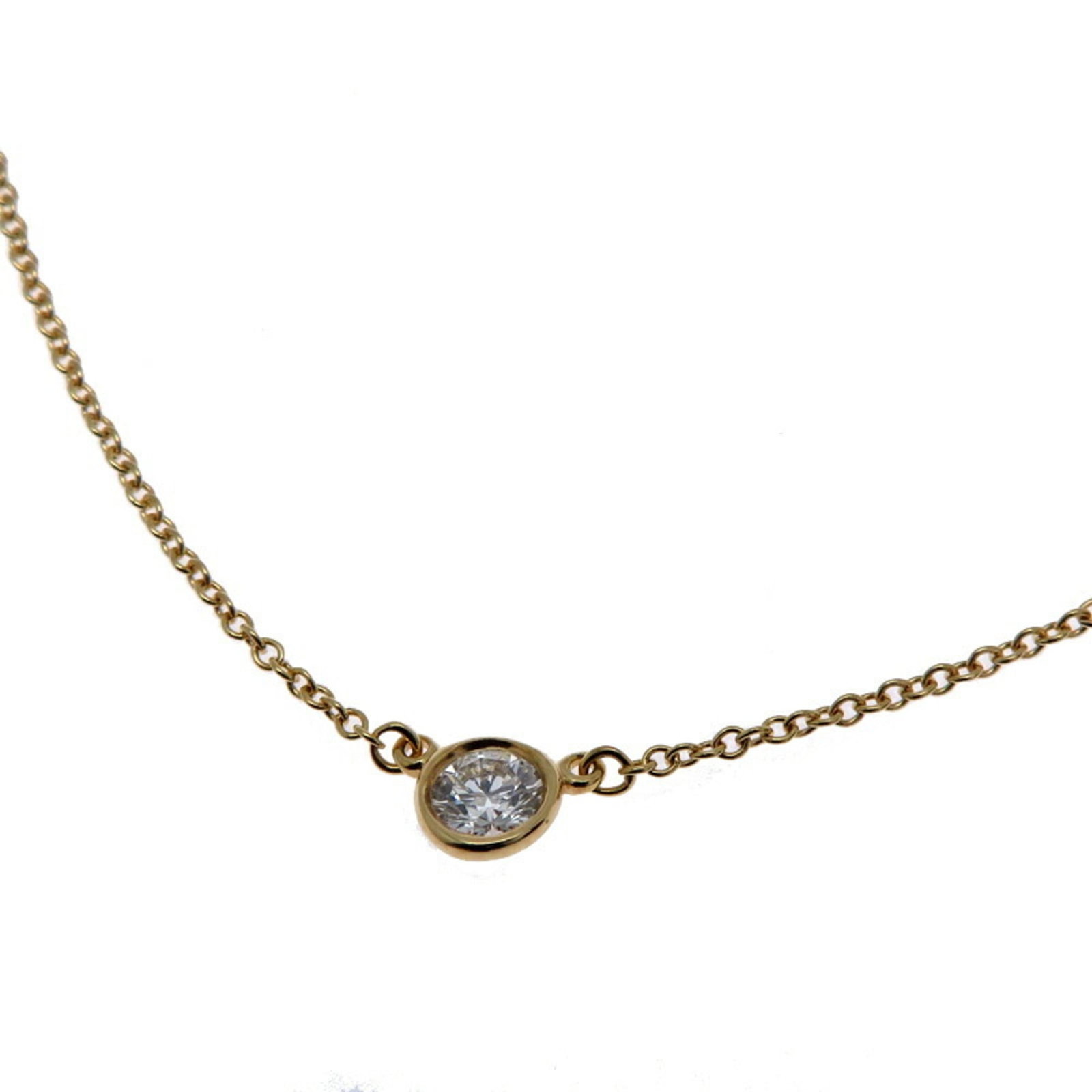 Tiffany 0.19Ct Diamond By The Yard Women'S Necklace 750 Yellow Gold: Tiffany 0.19Ct Diamond By The Yard Women'S Necklace 750 Yellow Gold Tiffany's 0.19Ct diamond necklace in 18K yellow gold boasts a stunning 4.8mm x 7.2mm pendant, set against a comfortable 40cm chain. 