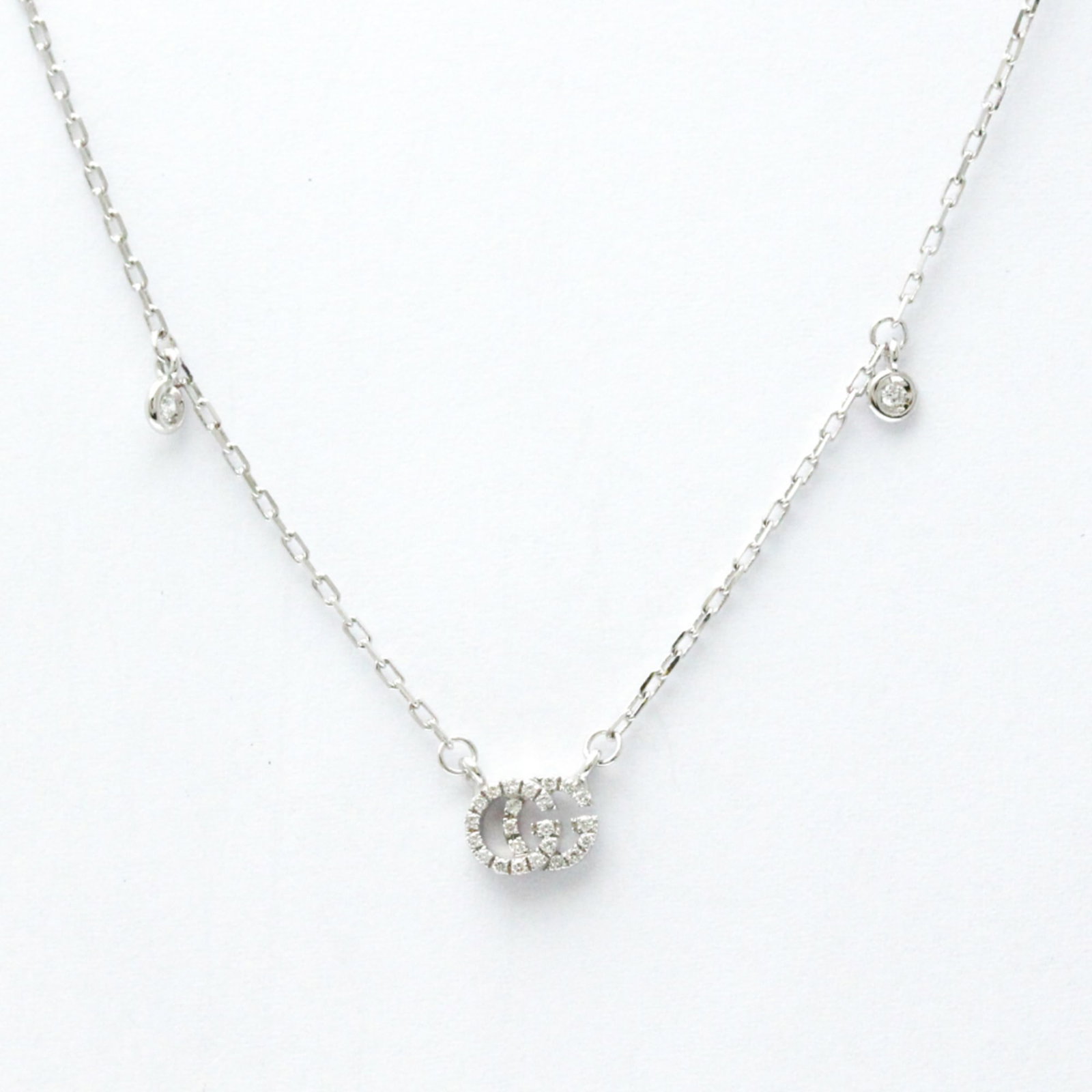 Gucci Gg Running Diamond Necklace White Gold (18K) Diamond Menwomen Fashion Pendant Necklace: Gucci Gg Running Diamond Necklace White Gold (18K) Diamond Menwomen Fashion Pendant Necklace Gucci's Gg Running Diamond Necklace shines with its striking design, featuring a 3.1g diamond pendant set i