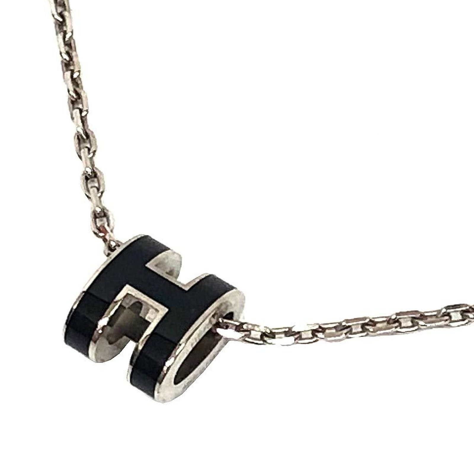 Hermes H Herms H Shaped Chain Mini Pop Ash Silver Black For Women: Hermes H Herms H Shaped Chain Mini Pop Ash Silver Black For Women The Hermes H-shaped chain mini pop necklace in silver and black features a striking design with a 9mm x 7.3mm pendant, measuring 39 cm