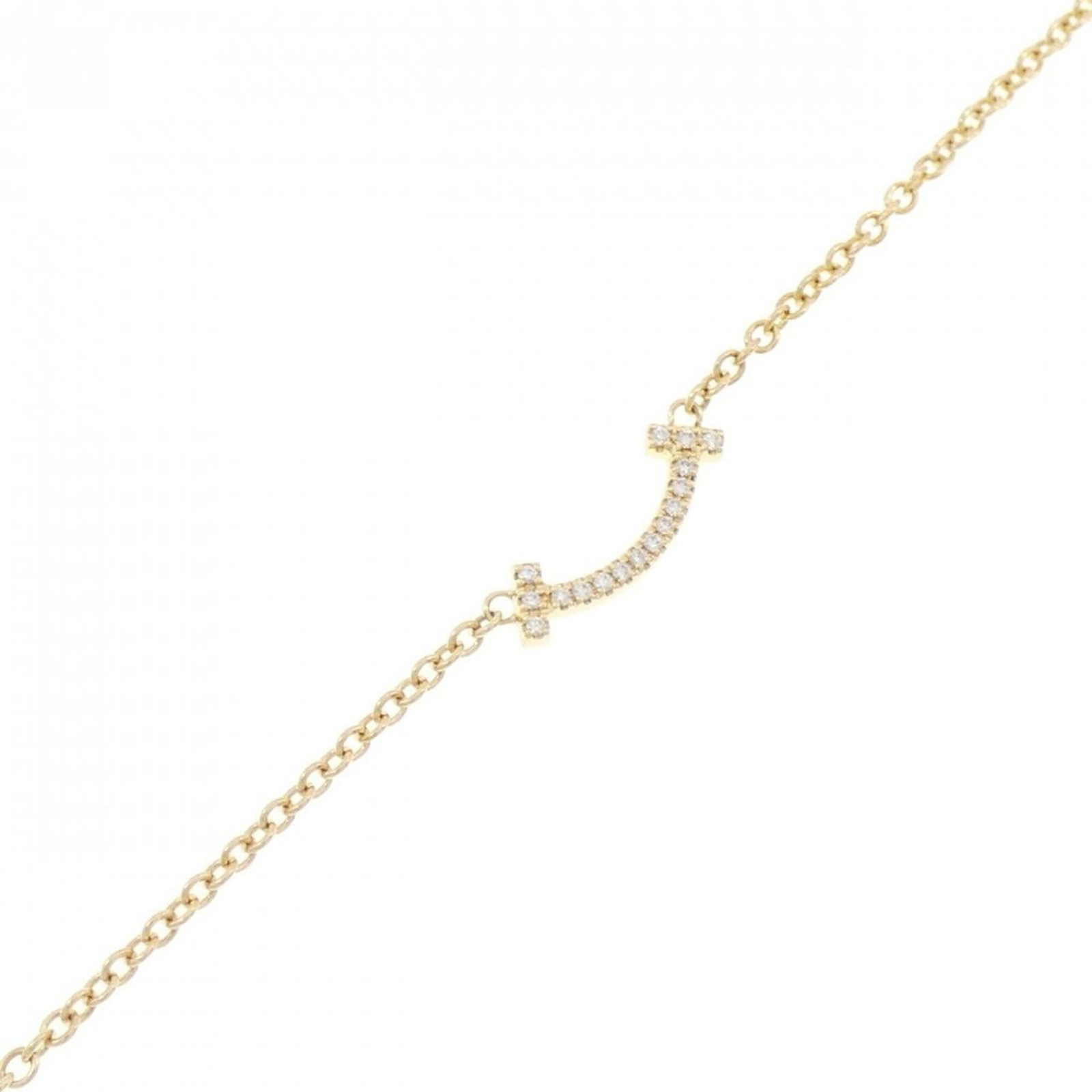 Tiffany Charm Bracelet Yellow Gold (18K): Tiffany Charm Bracelet Yellow Gold (18K) Yellow Gold (18K) Tiffany Charm Bracelet, featuring a delicate charm design and adorned with a diamond stone, showcases the elegance of Tiffany's signature