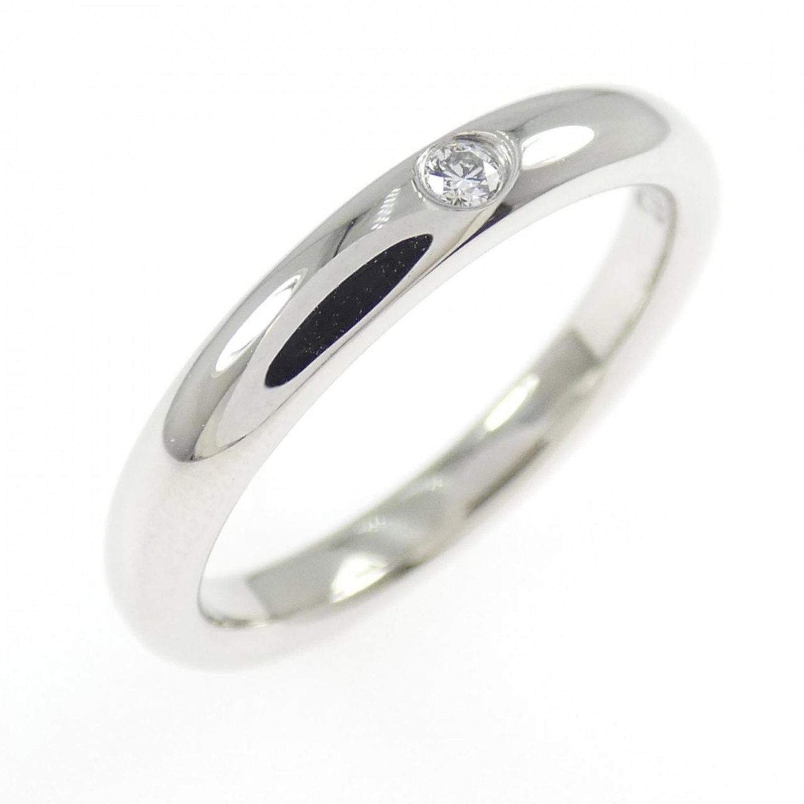 Platinum ring by Tiffany band: Platinum ring by Tiffany band Platinum ring by Tiffany features a diamond stone set in a band style design, crafted from high-quality platinum material. The item is a used (like new) condition, with h