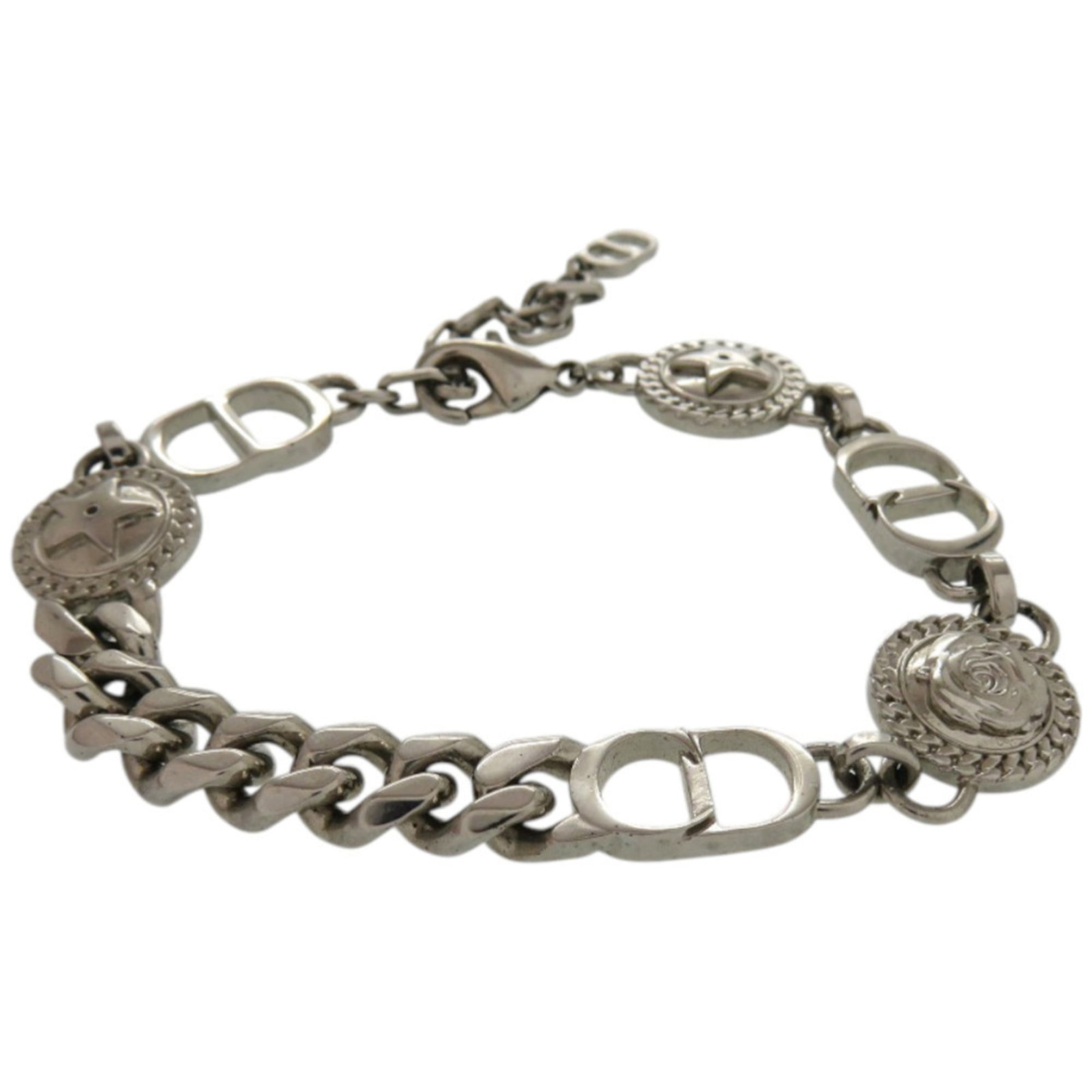Metal Charm Christian Dior: Metal Charm Christian Dior Silver Metal Charm from Christian Dior, measuring 25.7cm in length, bears some traces of usage with minor scratches and dirt. The charm's metal material gives it a sleek
