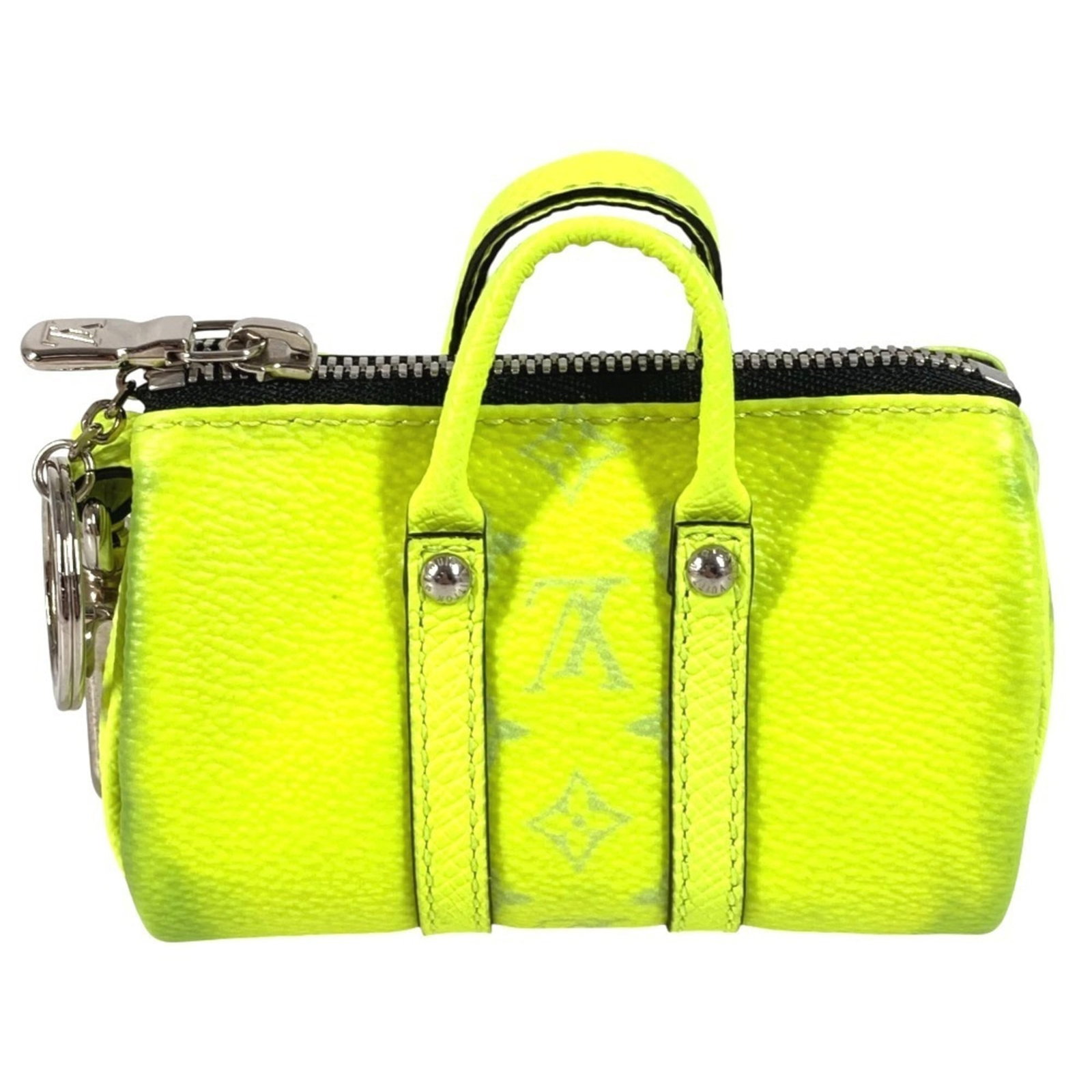 Handbag Monogram Louis Vuitton: Handbag Monogram Louis Vuitton Yellow Louis Vuitton Monogram Handbag Charm, measuring 60.00mm x 95.00mm, features the iconic monogram pattern in a vibrant yellow color. This used handbag charm has