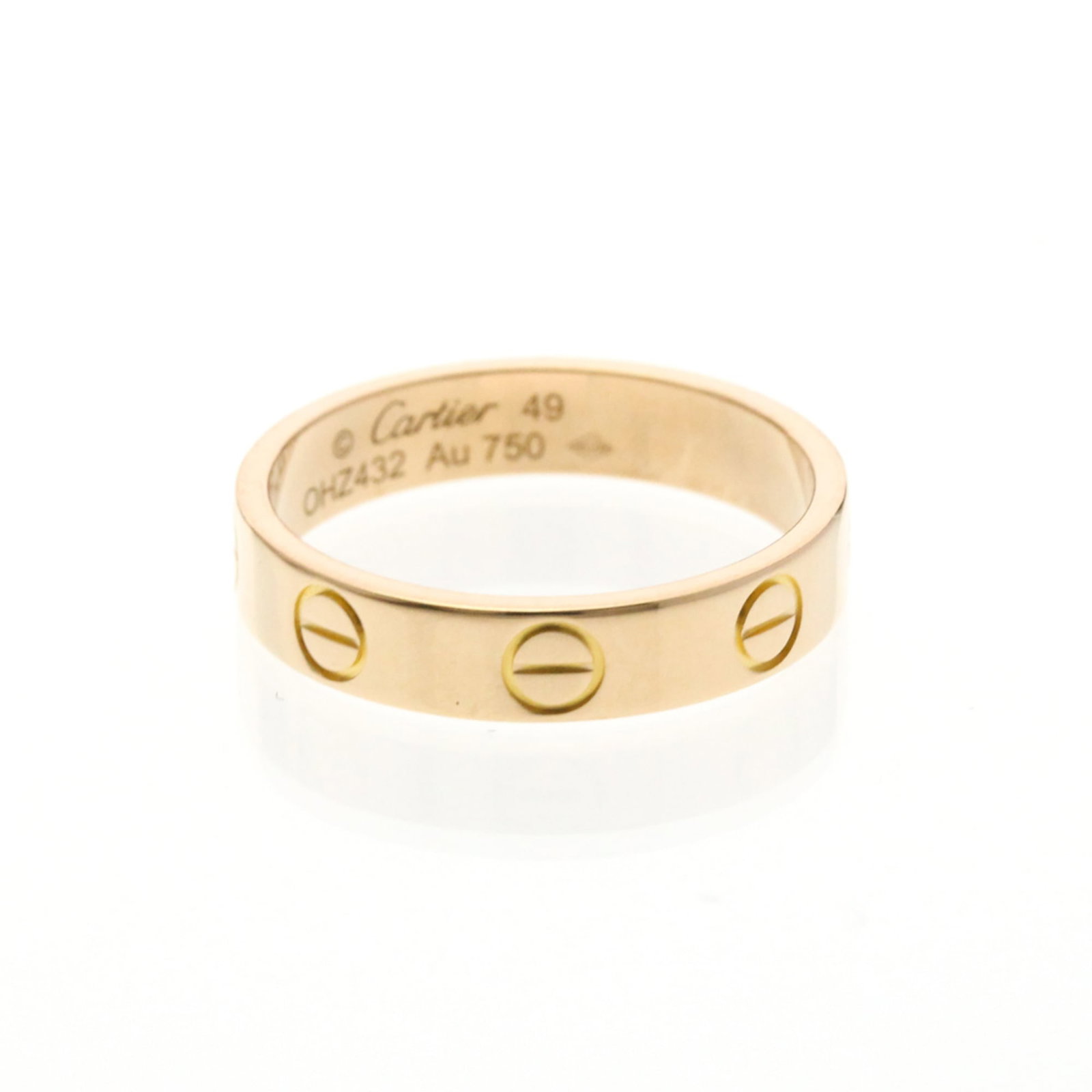 Pink gold 18k ring band from Cartier: Pink gold 18k ring band from Cartier Pink gold 18k Cartier ring band, featuring a sleek and sophisticated design in a vibrant pink hue. This fashion-forward piece boasts an 18K metal construction