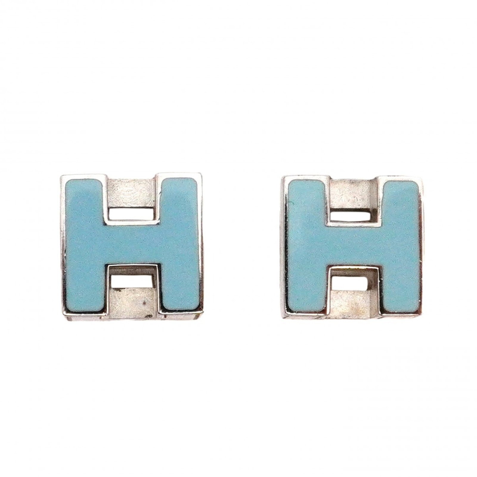 Hermes Stud Earrings Metal: Hermes Stud Earrings Metal Stud earrings from the iconic French fashion house Hermes, featuring a striking blue hue and sleek silver metal design. Measuring 7.60mm in diameter, these small yet