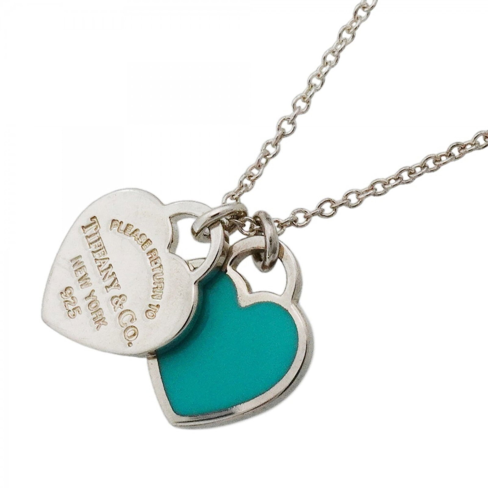 Tiffany & Co. Return To Heart Necklace Sterling Silver 925 Blue Women'S: Tiffany & Co. Return To Heart Necklace Sterling Silver 925 Blue Women'S Sterling silver necklace with blue pendant, made by Tiffany & Co. The Return To Heart Necklace features a 13.7mm x 13.4mm blue
