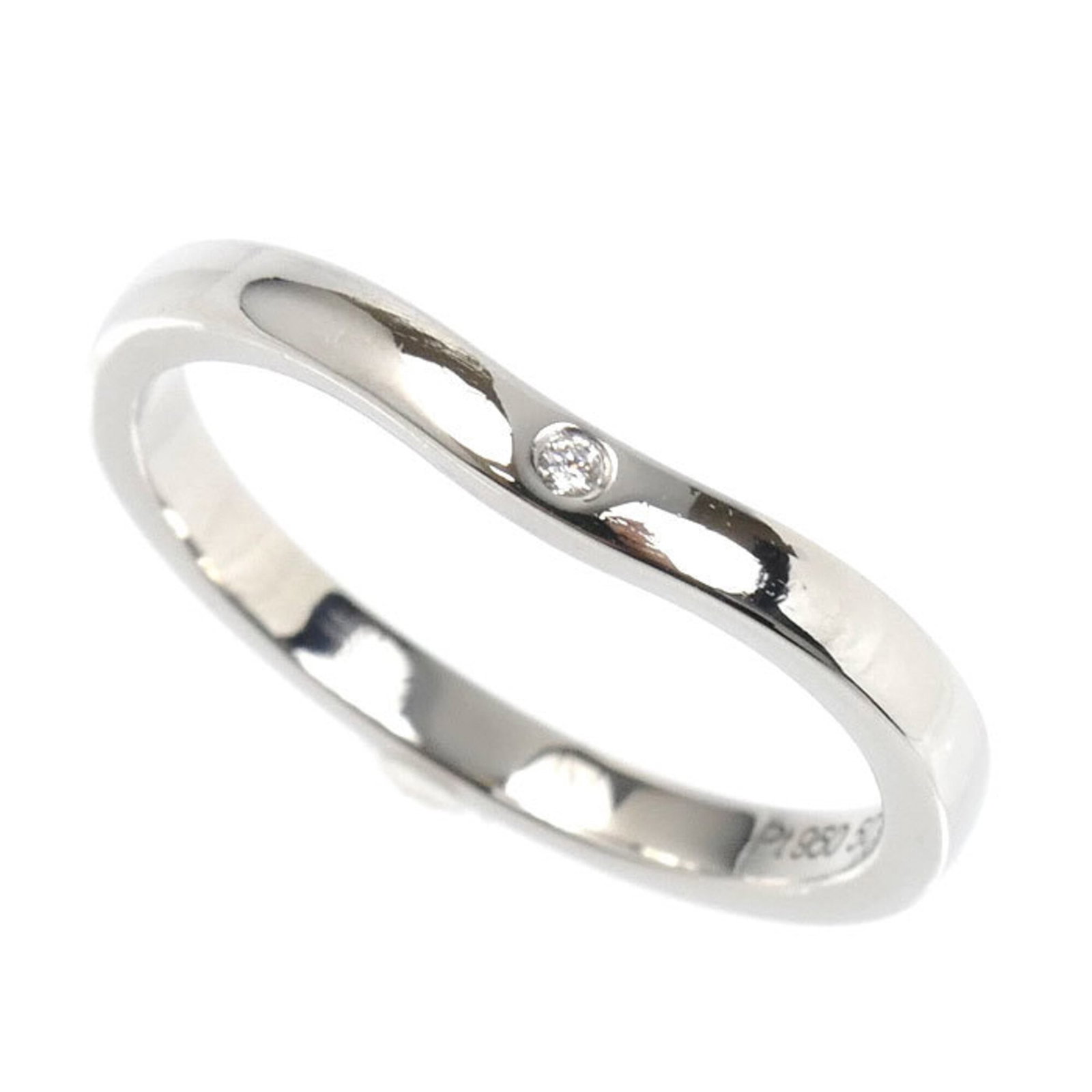Ring Band by Platinum 950: Ring Band by Platinum 950 Made from durable Platinum 950, this Cartier band ring boasts a sleek design. Featuring a diamond stone, the subtle sparkle adds a touch of elegance to any outfit. With its c