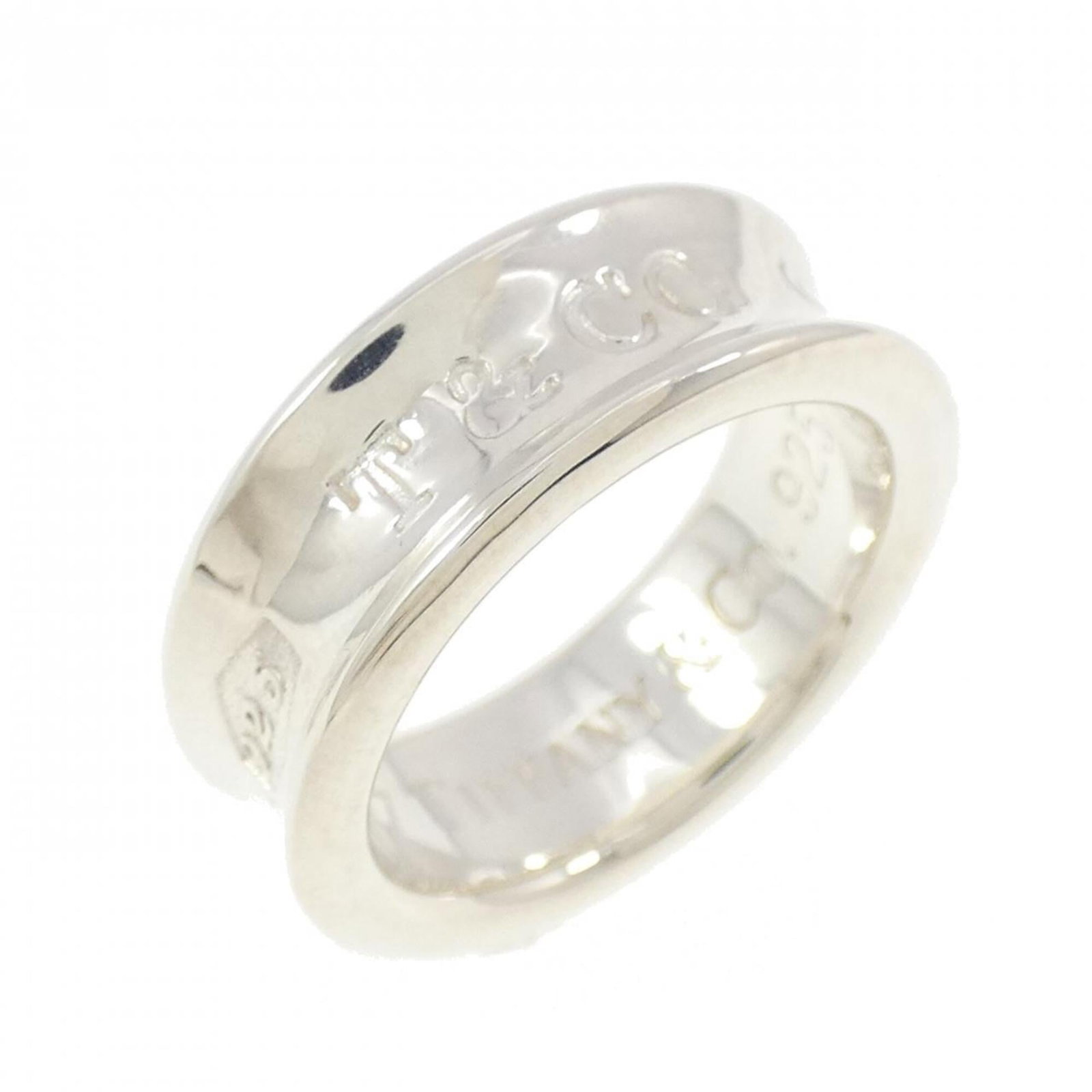 Tiffany Band Ring Silver 925: Tiffany Band Ring Silver 925 Silver 925 band ring from Tiffany, featuring a classic design with subtle elegance. This used item has hardly any traces of usage and is in like new condition, making it