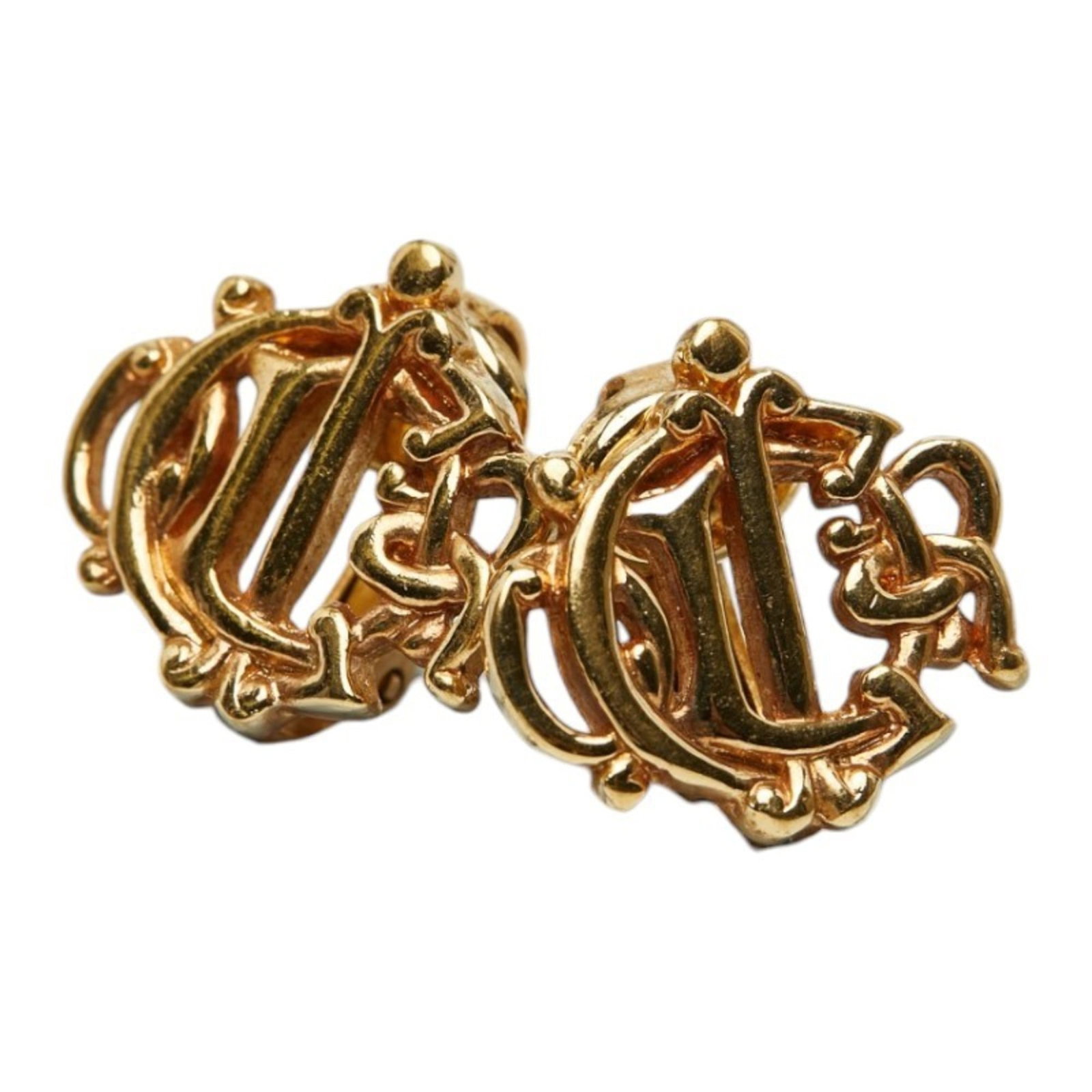Clip earrings by Christian Dior: Clip earrings by Christian Dior Clip earrings by Christian Dior, featuring a gold finish with traces of usage and minor scratches. The earrings measure 16.50mm x 17.60mm and are in good condition