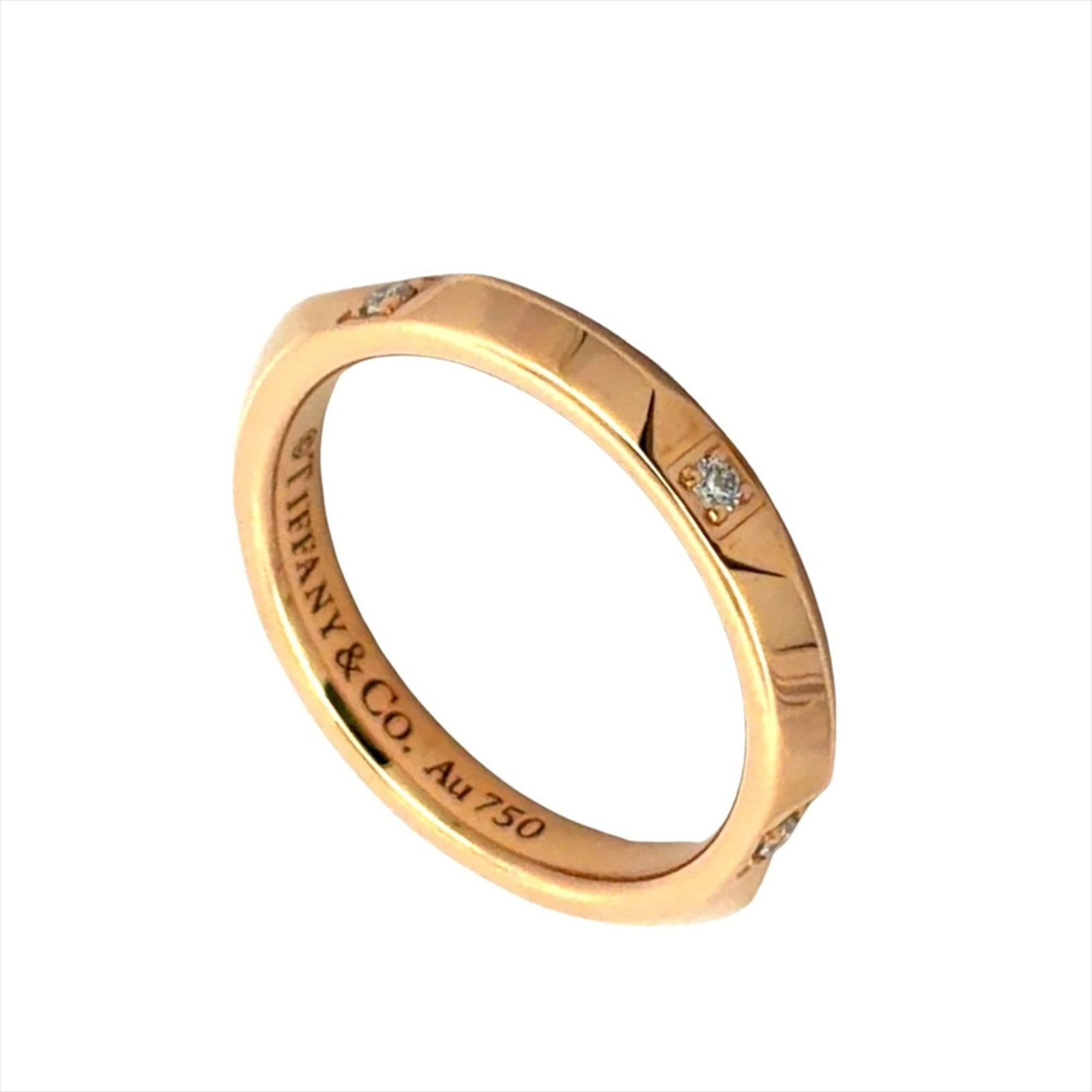 Pink Gold Ring Band Tiffany: Pink Gold Ring Band Tiffany Pink Gold Ring Band Tiffany, 18K Pink Gold with Diamond Stone, Us Size 3.5, Used (like new) Condition. This pink gold ring band features a diamond stone and bears a signatu