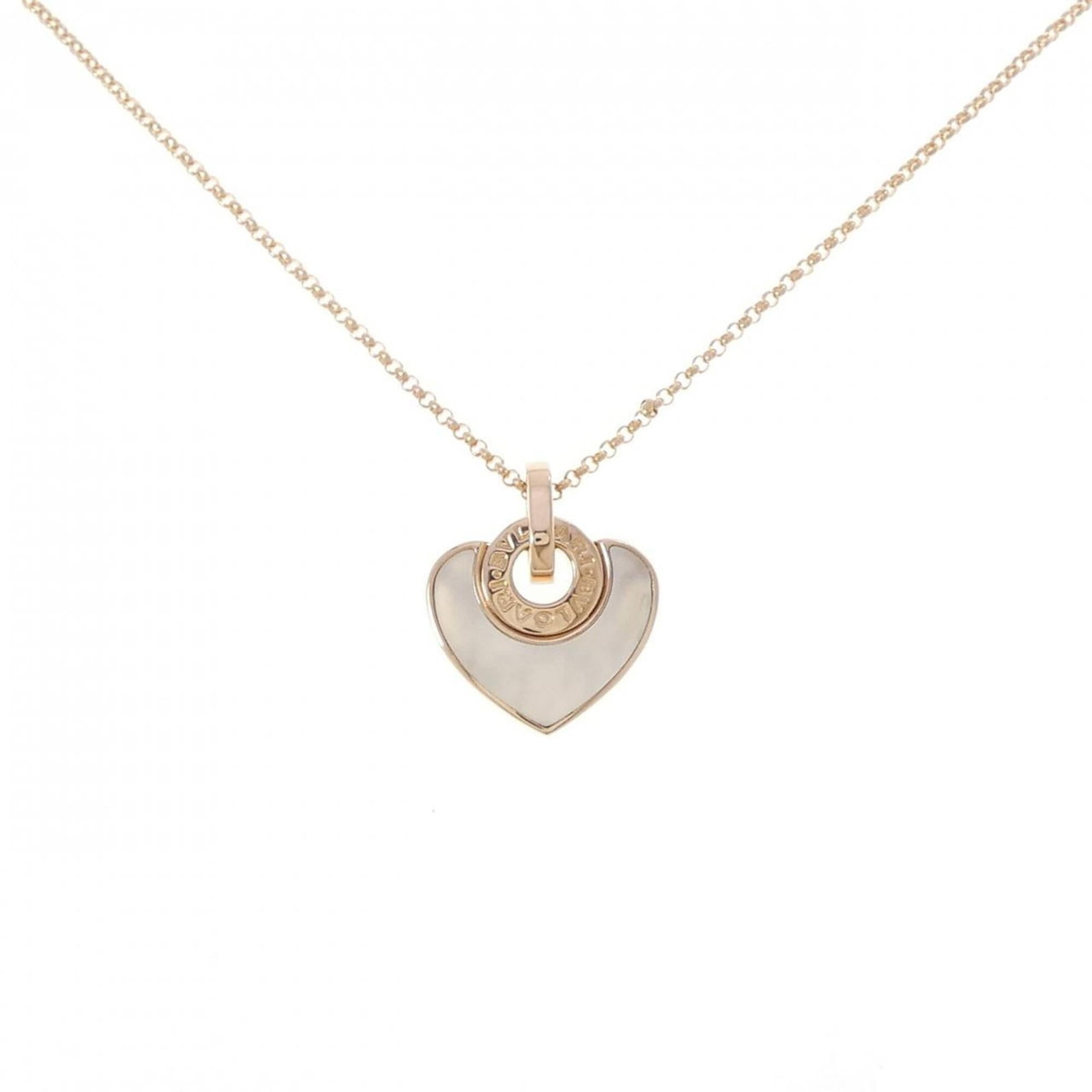 Bvlgari Cuore Necklace: Bvlgari Cuore Necklace Pink gold (18K) pendant featuring mother of pearl, set in a classic Bvlgari Cuore design. This elegant necklace boasts a timeless beauty with its subtle pink hue and delicate de