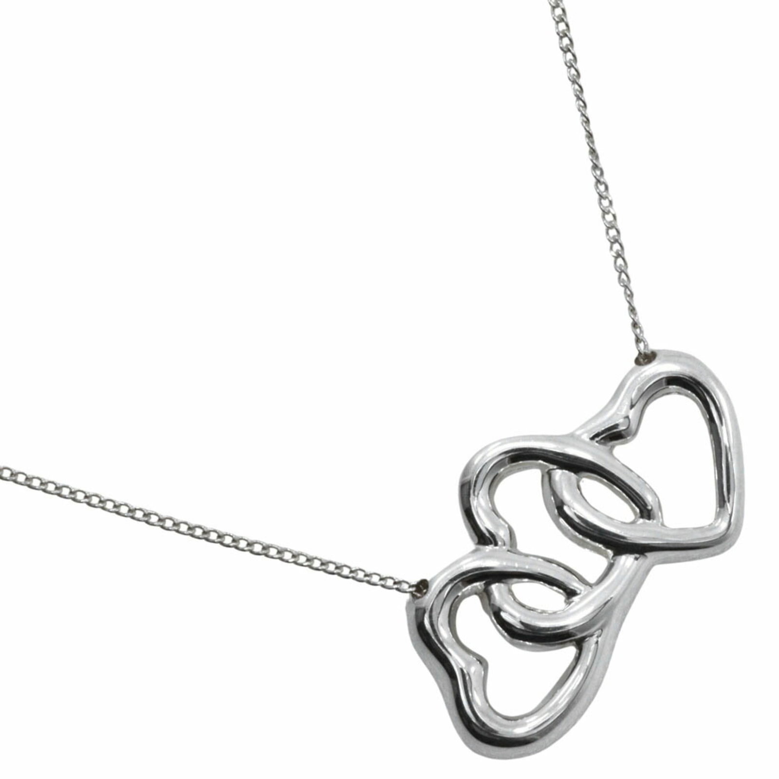 Tiffany & Co. Triple Heart Necklace 925 Sterling Silver Approx. 4.6G Women'S: Tiffany & Co. Triple Heart Necklace 925 Sterling Silver Approx. 4.6G Women'S Tiffany & Co. Triple Heart Necklace in sterling silver, featuring a 14mm x 25mm pendant with a 44.5 cm chain circumference,