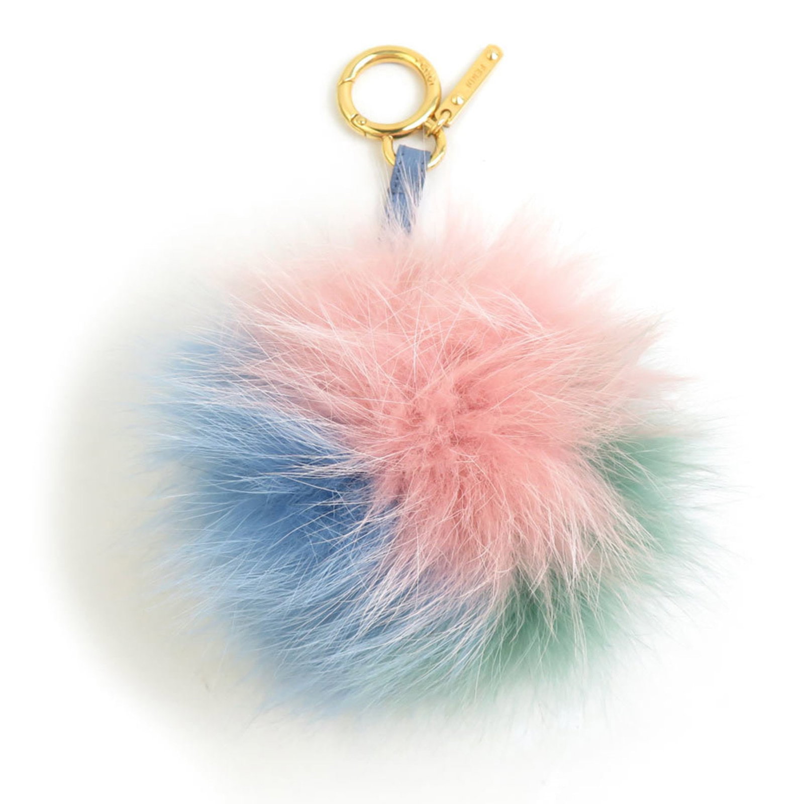 Fendi Handbag Charm Fur Metal: Fendi Handbag Charm Fur Metal Fur and metal come together in a vibrant, multi-colored Fendi handbag charm. This used item boasts a few traces of usage, with some scratches and dirt visible, but