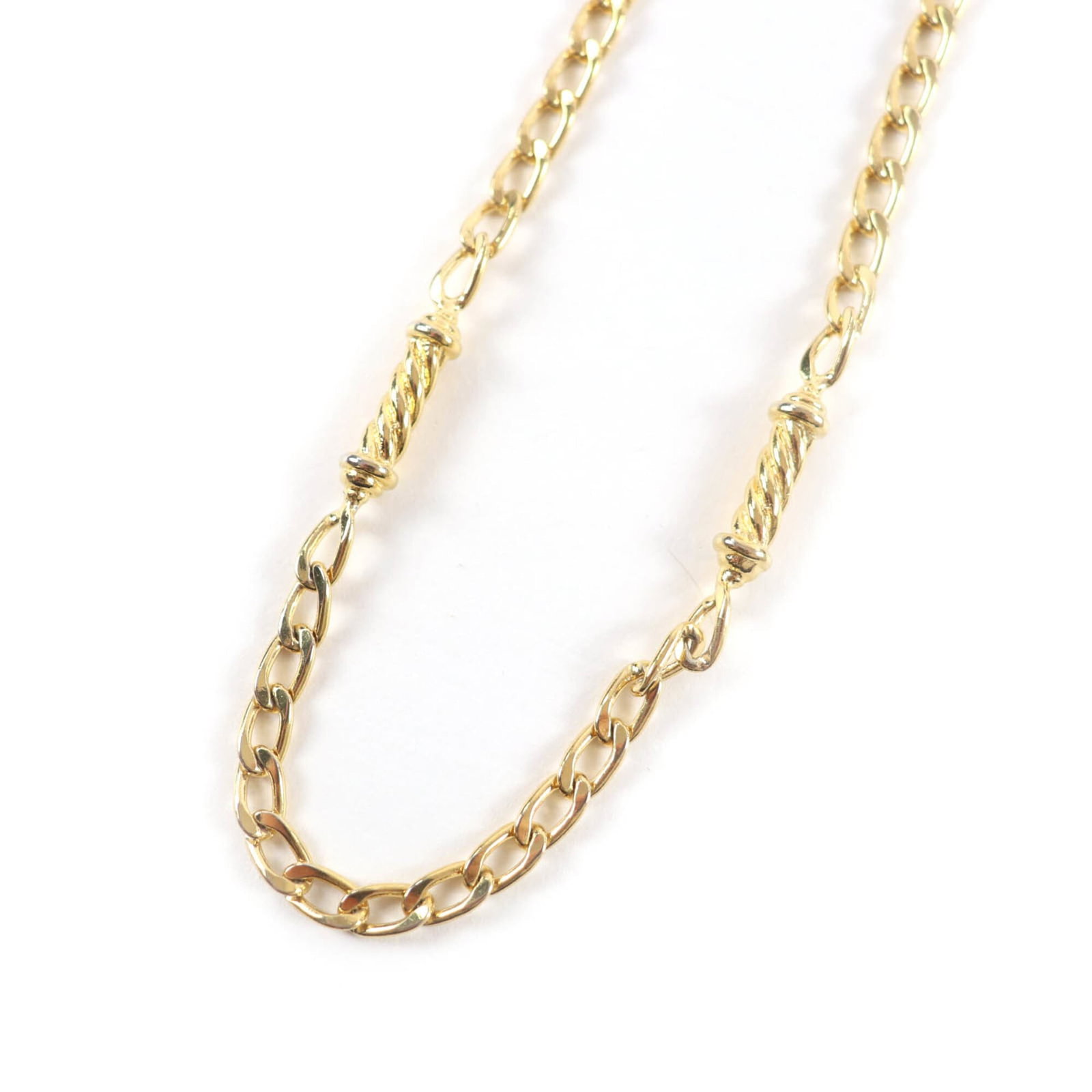 Women's Celine 2-Way Twist Motif Gold Colored Necklace: Women's Celine 2-Way Twist Motif Gold Colored Necklace Gold Colored Twist Motif Necklace from Celine, featuring a unique 2-way twist design. The necklace measures 80 cm in circumference and bears a