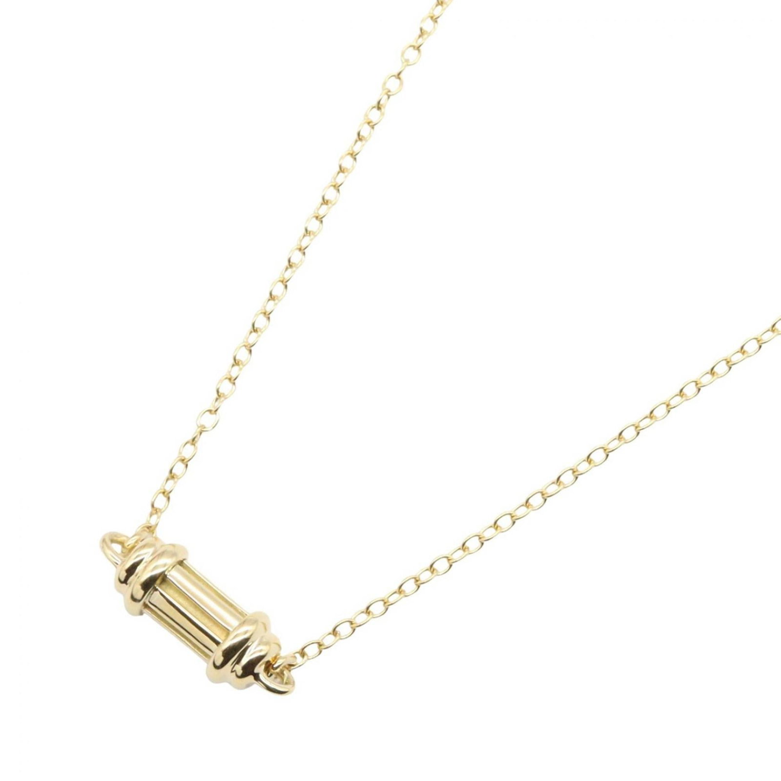 Women's 18K Yellow Gold Necklace Bottle Cylinder Tiffany: Women's 18K Yellow Gold Necklace Bottle Cylinder Tiffany 18K Yellow Gold Bottle Cylinder Necklace from Tiffany. This beautiful necklace features a stunning bottle cylinder pendant in yellow gold, with